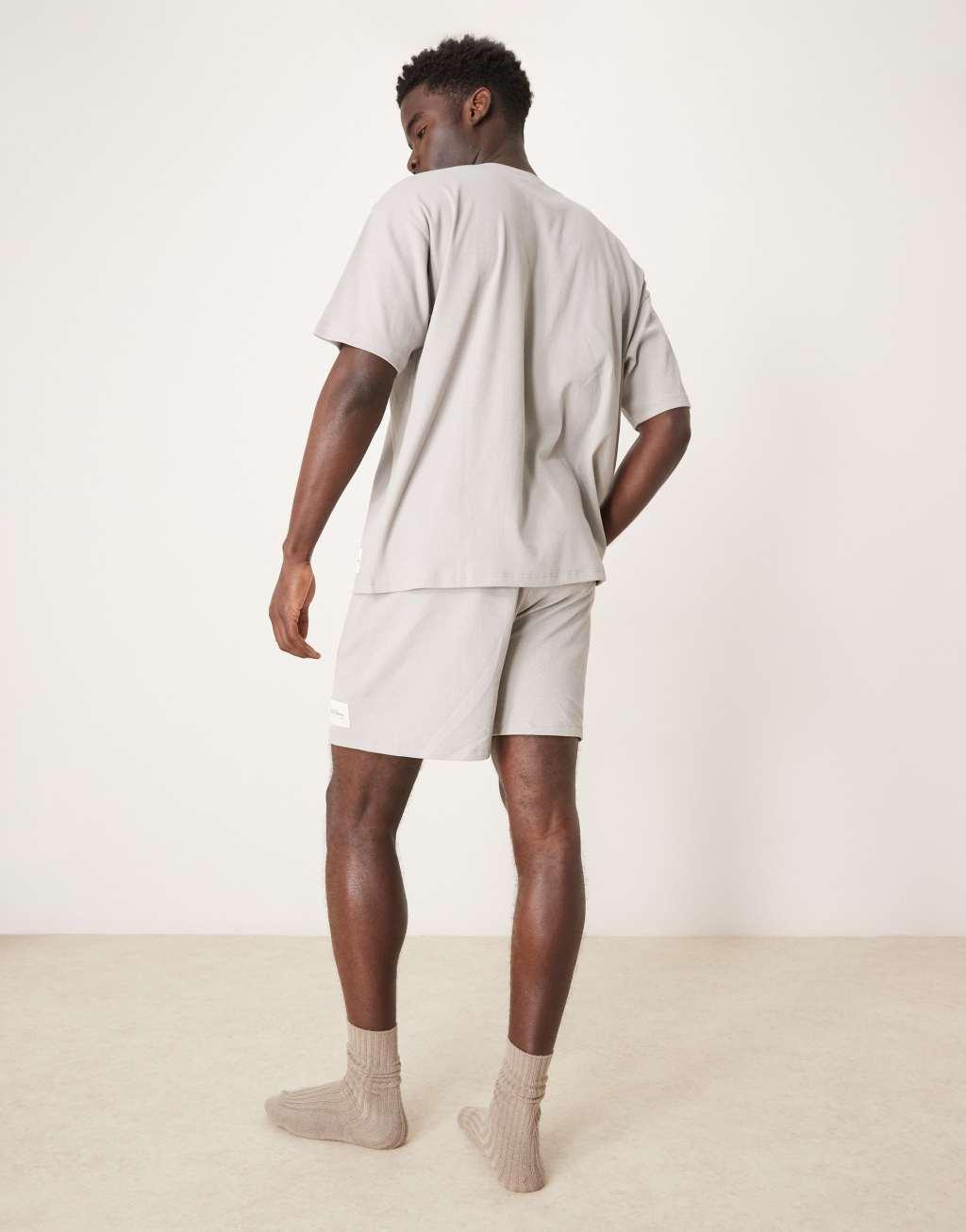 ASOS DESIGN ribbed T-shirt and shorts lounge set with embroidered patch in gray Product Image