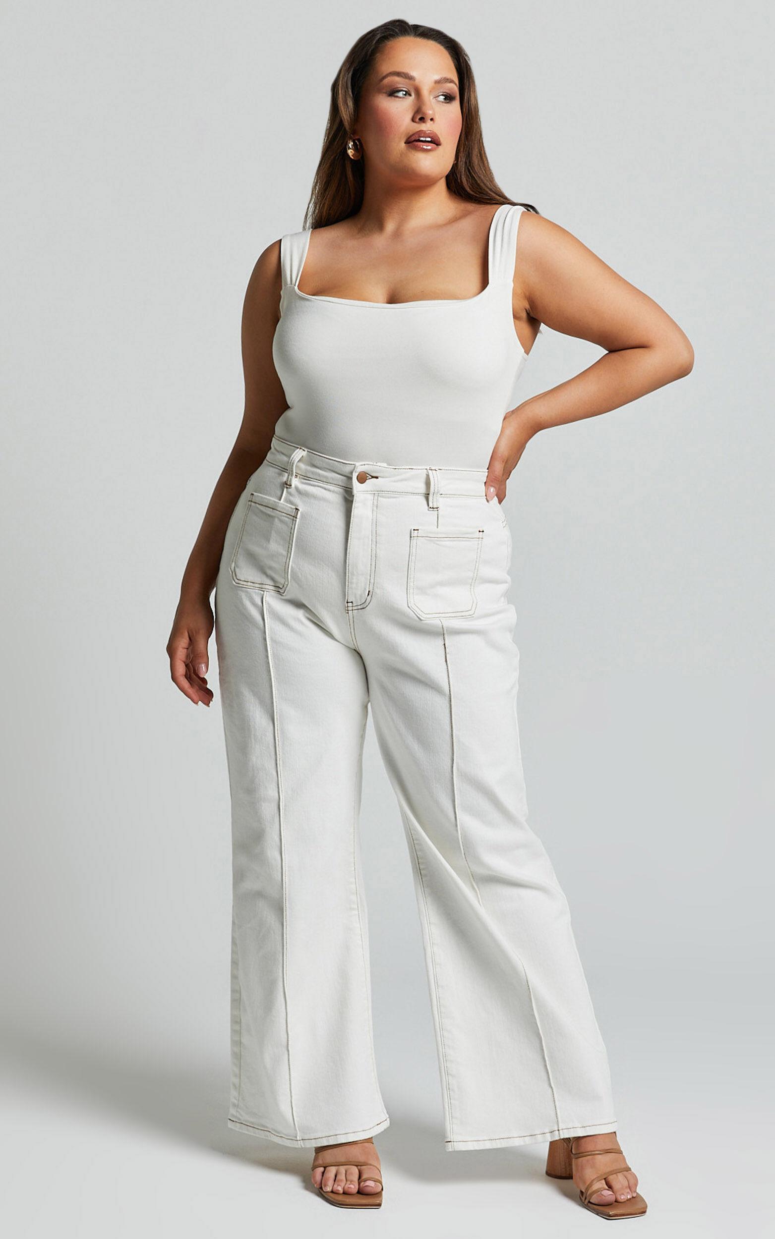 Malcolm Jeans - Mid Rise Contrast Stitch Flared Denim Jeans in White Denim Product Image