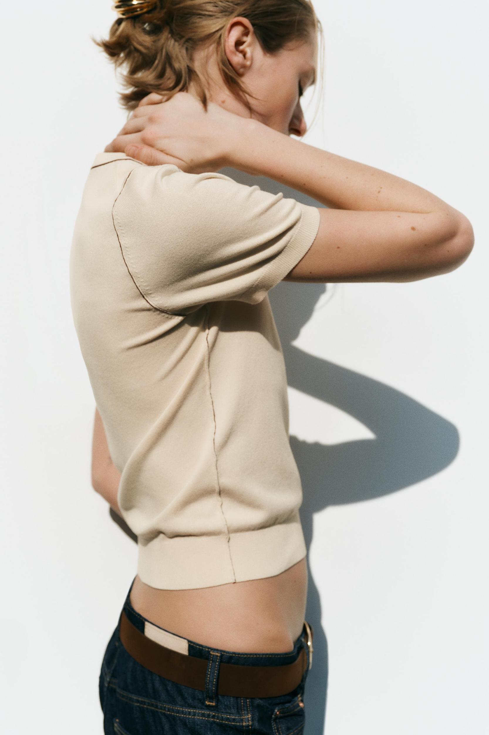 TRIMMED SHORT SLEEVE KNIT TOP Product Image