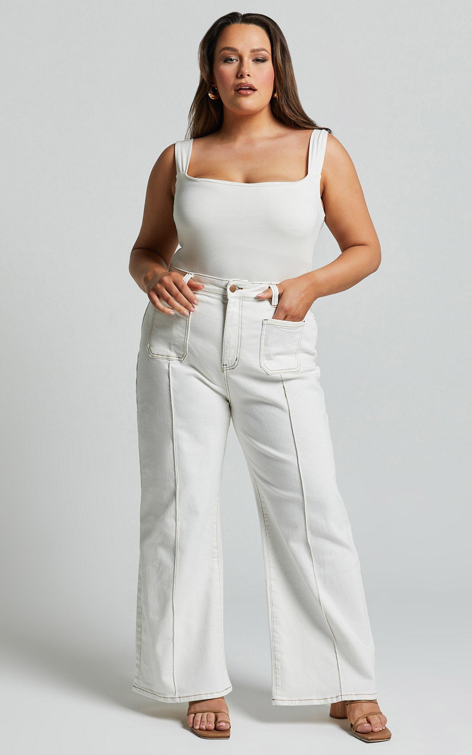 Malcolm Jeans - Mid Rise Contrast Stitch Flared Denim Jeans in White Denim Product Image