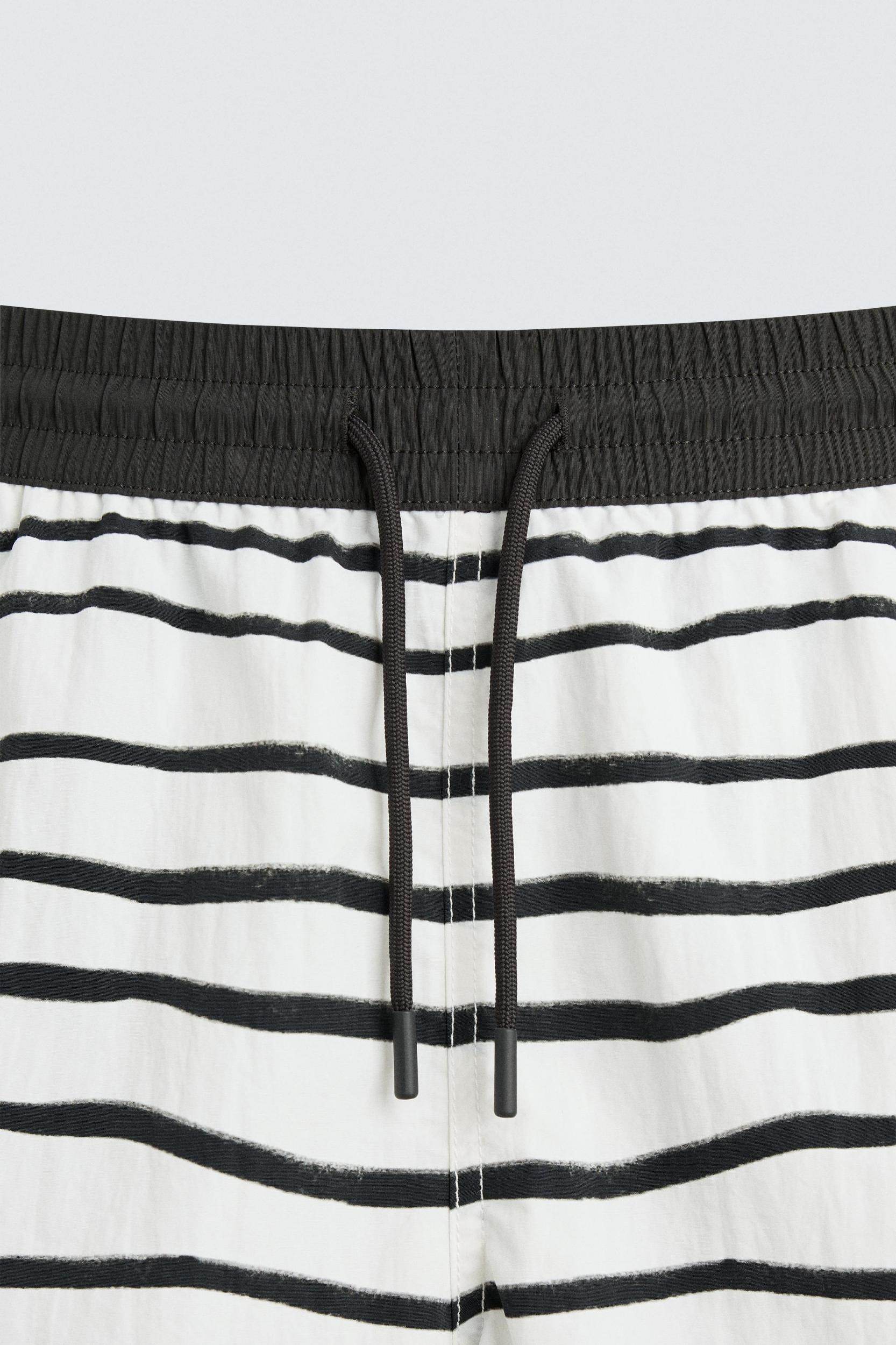 OTIS KWAME KYE QUAICOE PRINTED MID-LENGTH SWIMSUIT Product Image