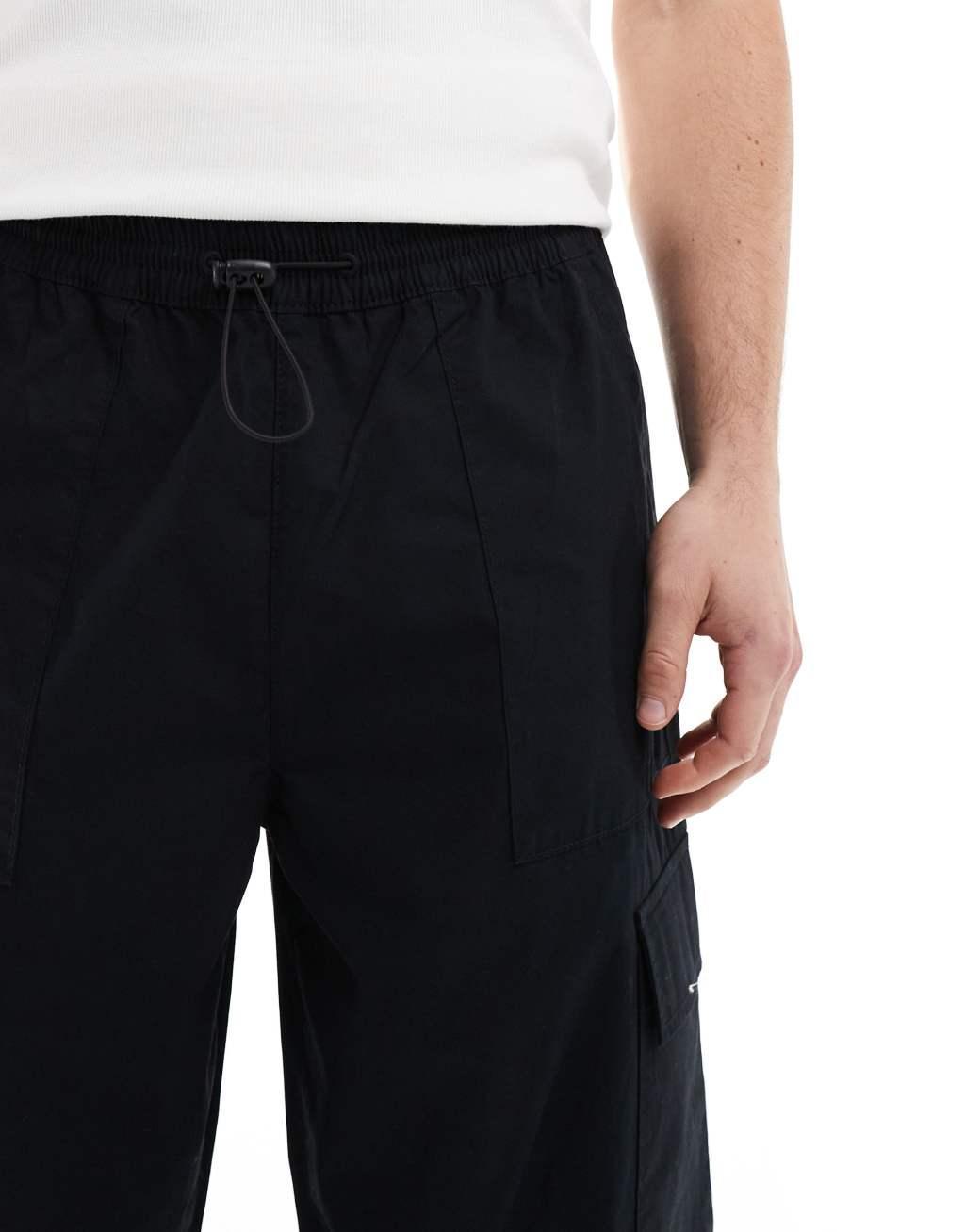 ASOS DESIGN poplin cargo pants in black with elastic waist Product Image