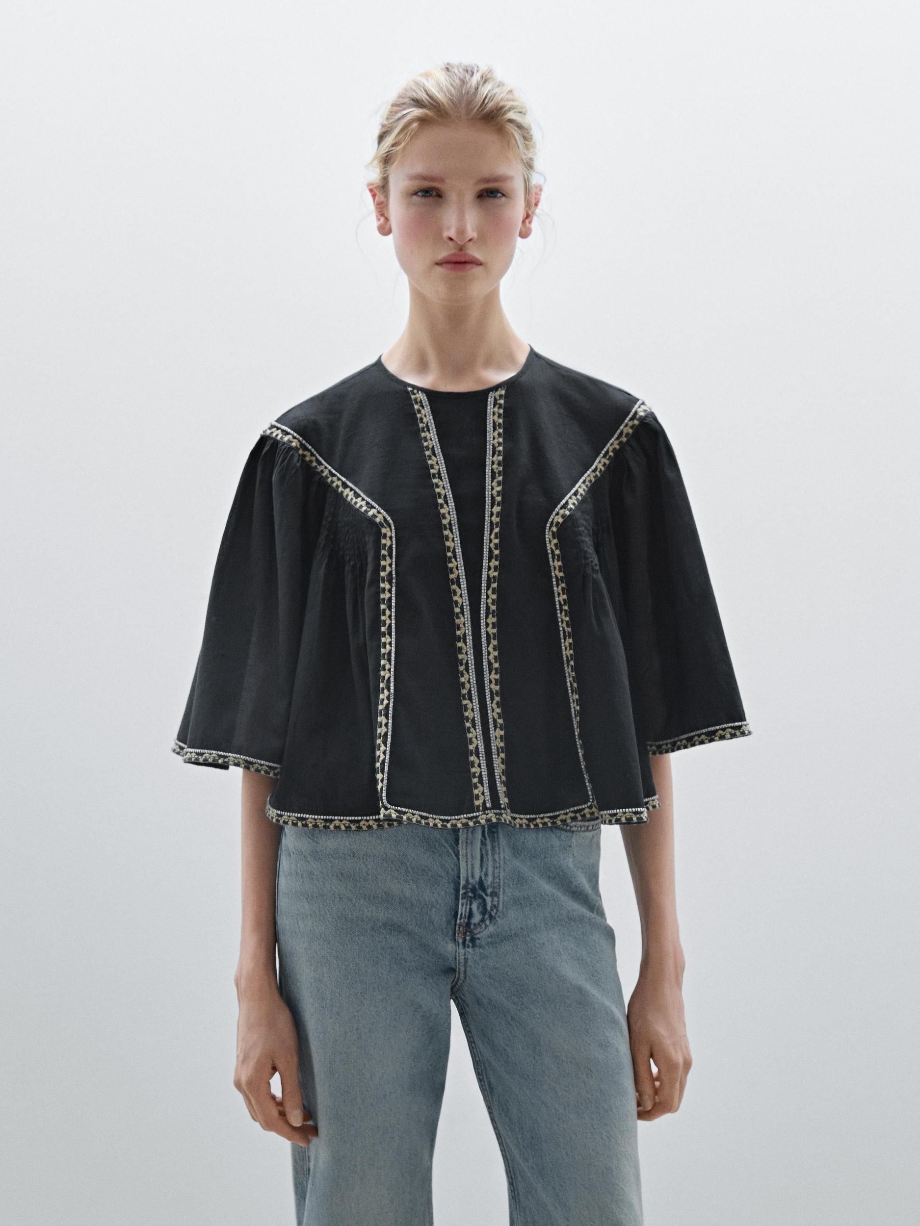 Flowing blouse with embroidered details Product Image