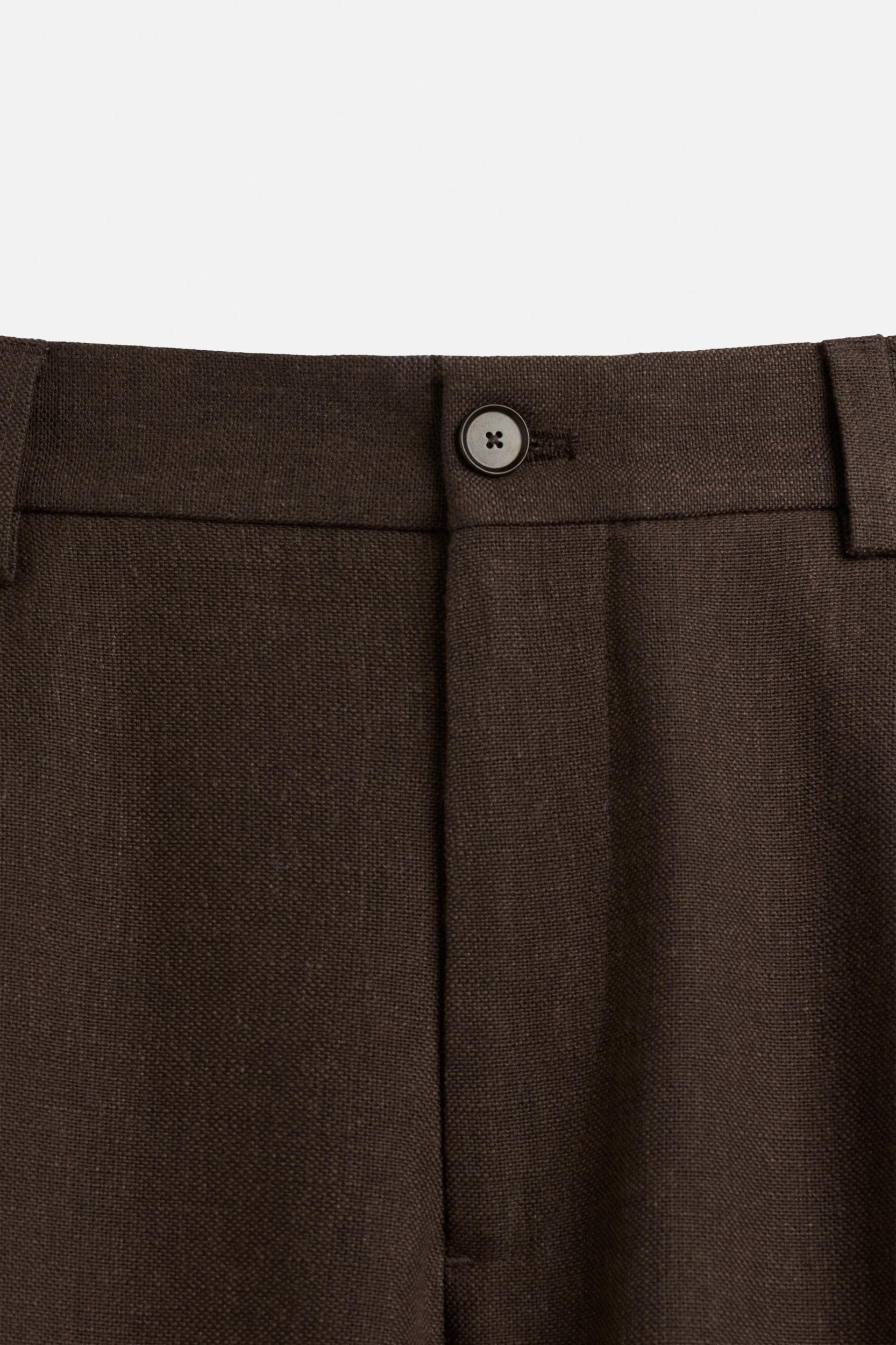 TEXTURED PLEATED SHORTS Product Image