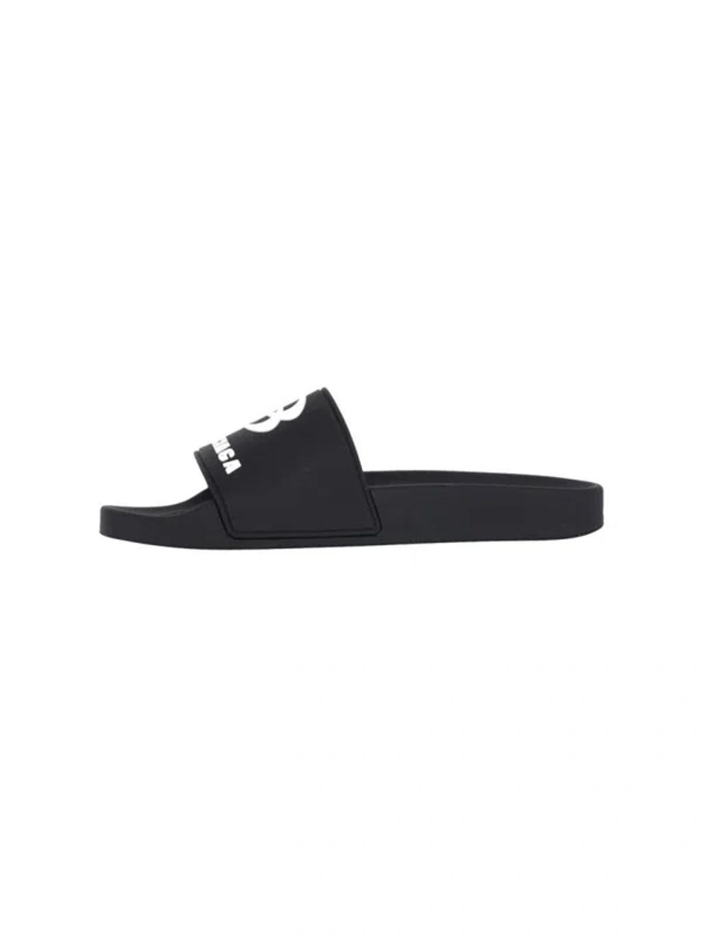 BALENCIAGA Rubber Slide Sandals For The Pool Men In Black White Product Image