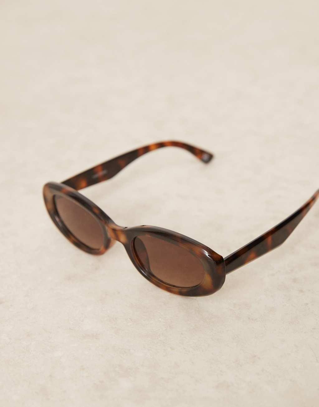 ASOS DESIGN oval sunglasses in tort Product Image