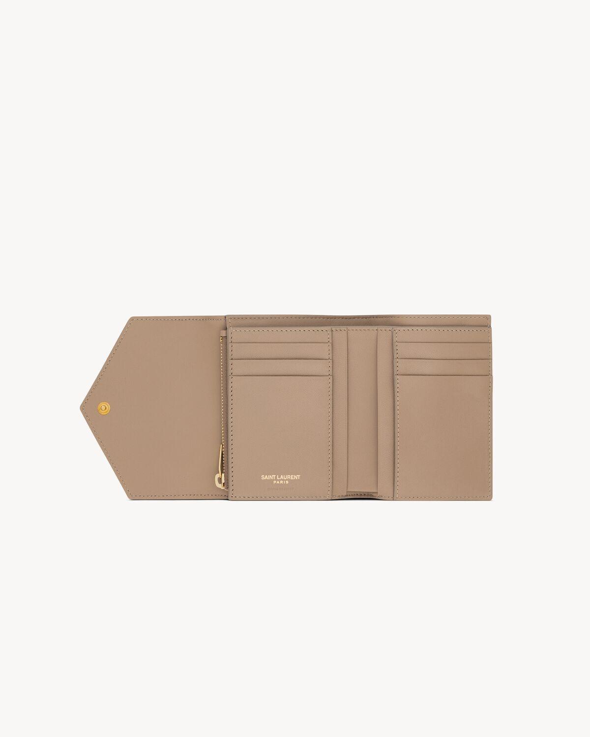 CASSANDRE MATELASSÉ compact tri fold wallet in grain de poudre leather | Saint Laurent | YSL.com Product Image