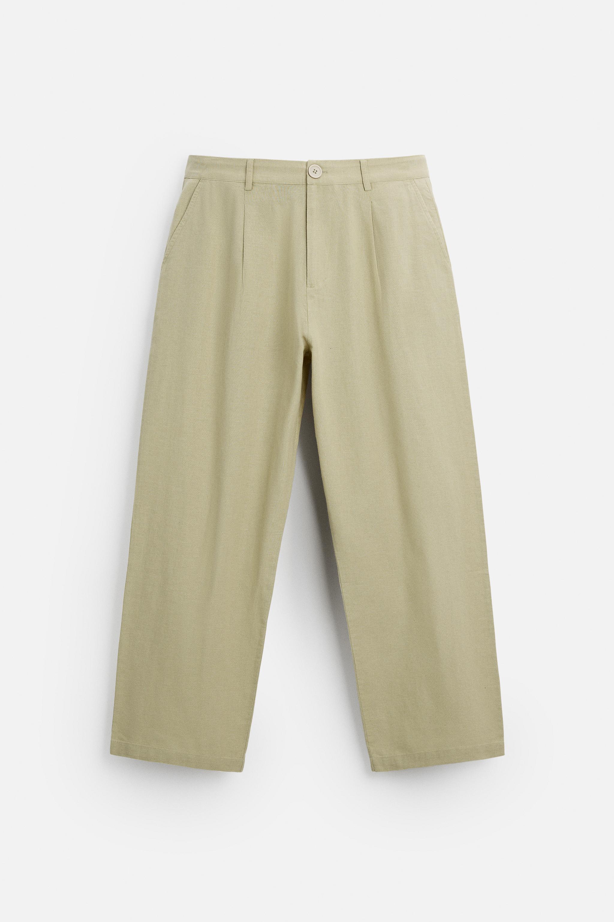 RELAXED FIT PLEATED PANTS Product Image