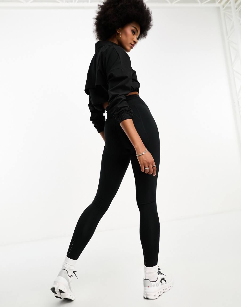 ASOS 4505 Hourglass Icon running tie waist gym legging with phone pocket Product Image