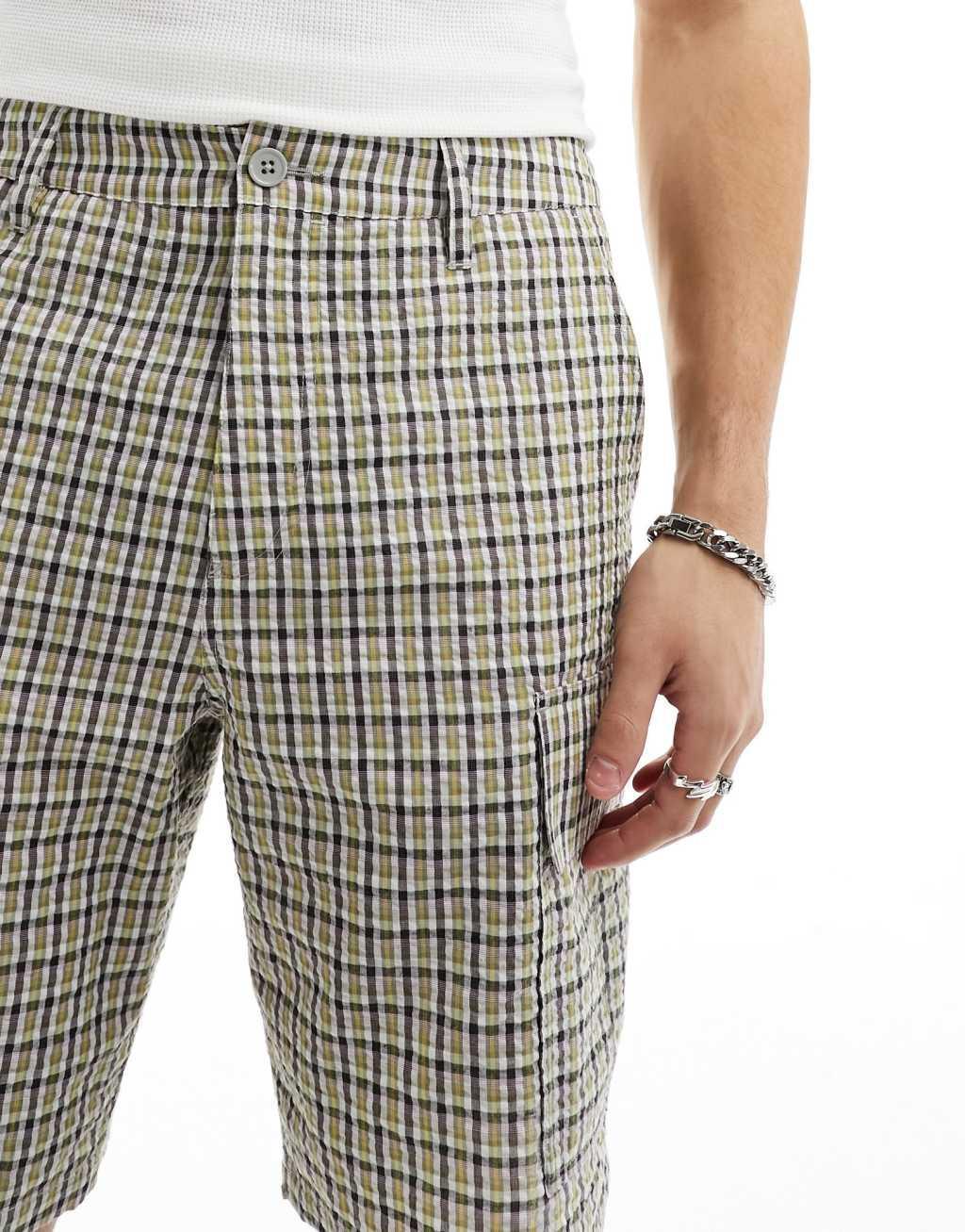 ASOS DESIGN fit cargo shorts in textured plaid print Product Image