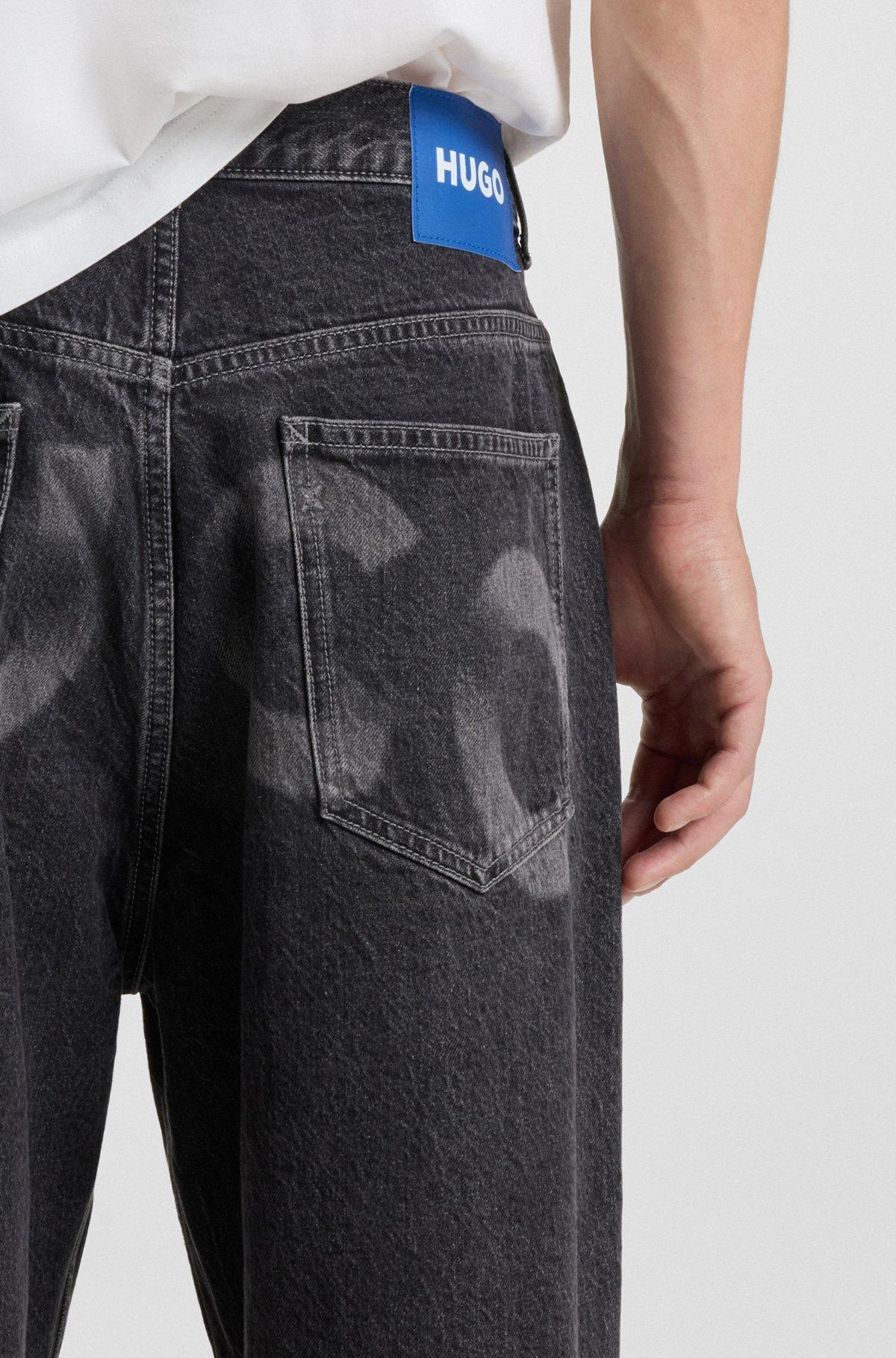 Baggy-fit jeans in black denim with faded logo Product Image