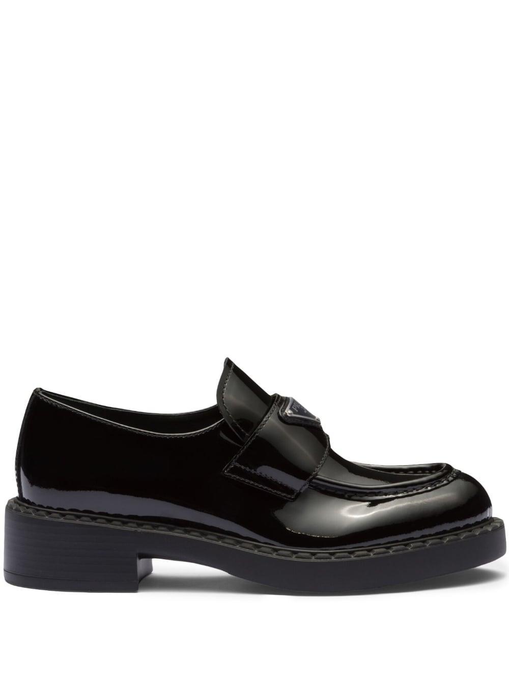 PRADA Enamel Triangle Logo Plaque Loafers In Nero Product Image