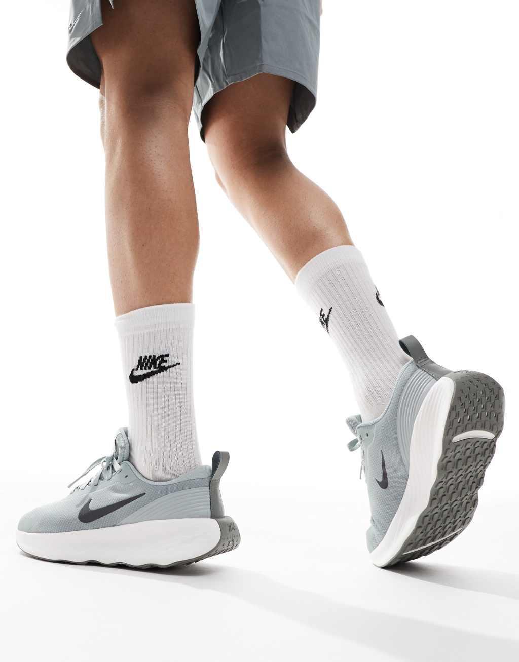 Nike Training Legend Essential 4 sneakers in gray and white Product Image