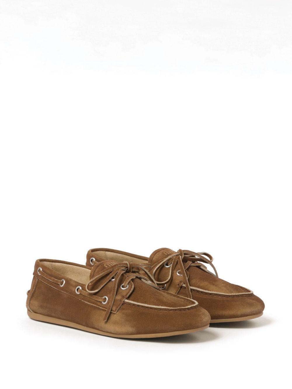 logo-embossed suede loafers Product Image