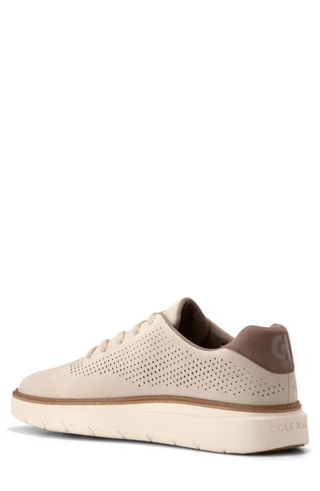 COLE HAAN Grandpro Featherarc Laser Sneaker In Oxford Tan-ivory Product Image