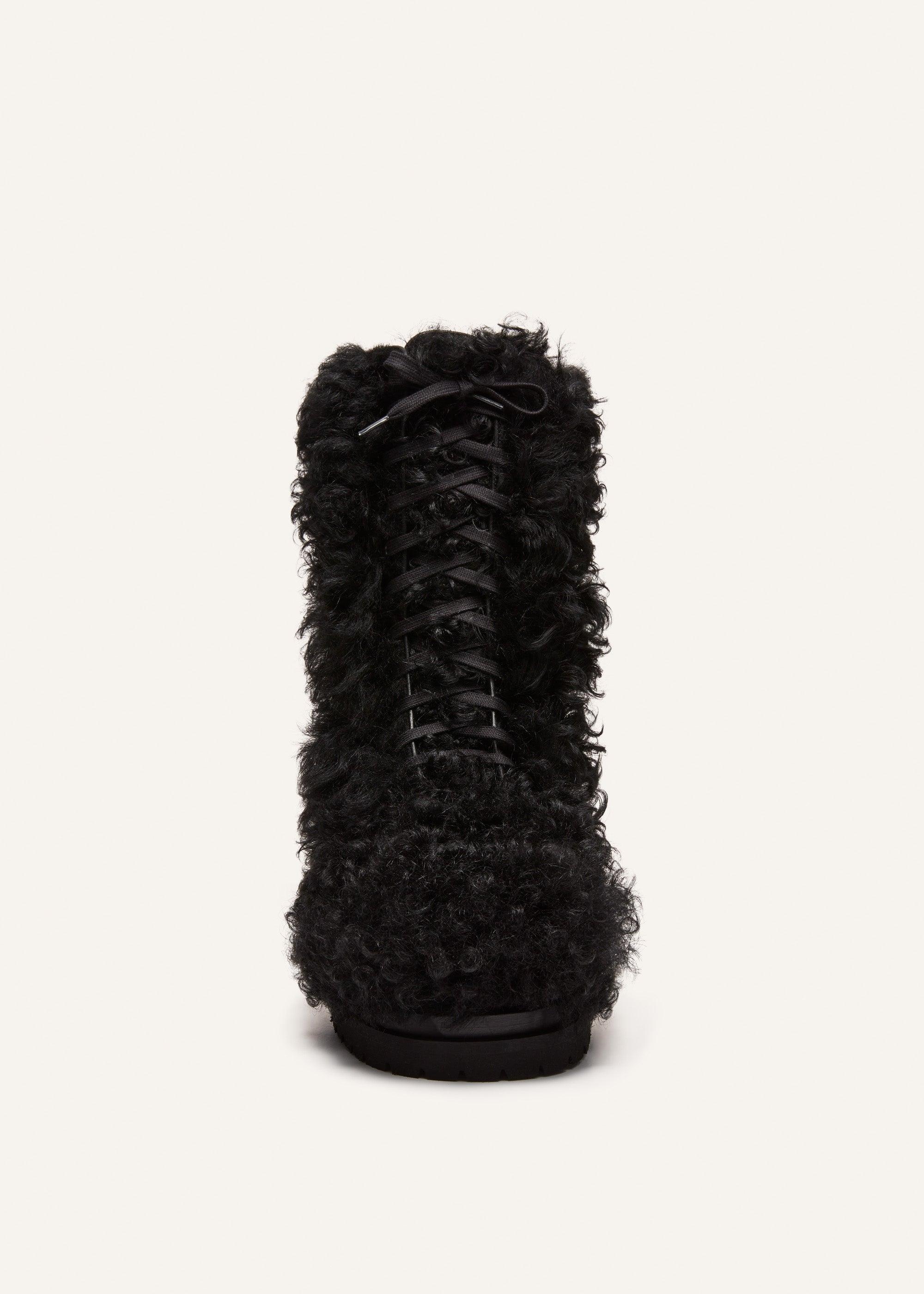 Shearling combat boots in black Product Image