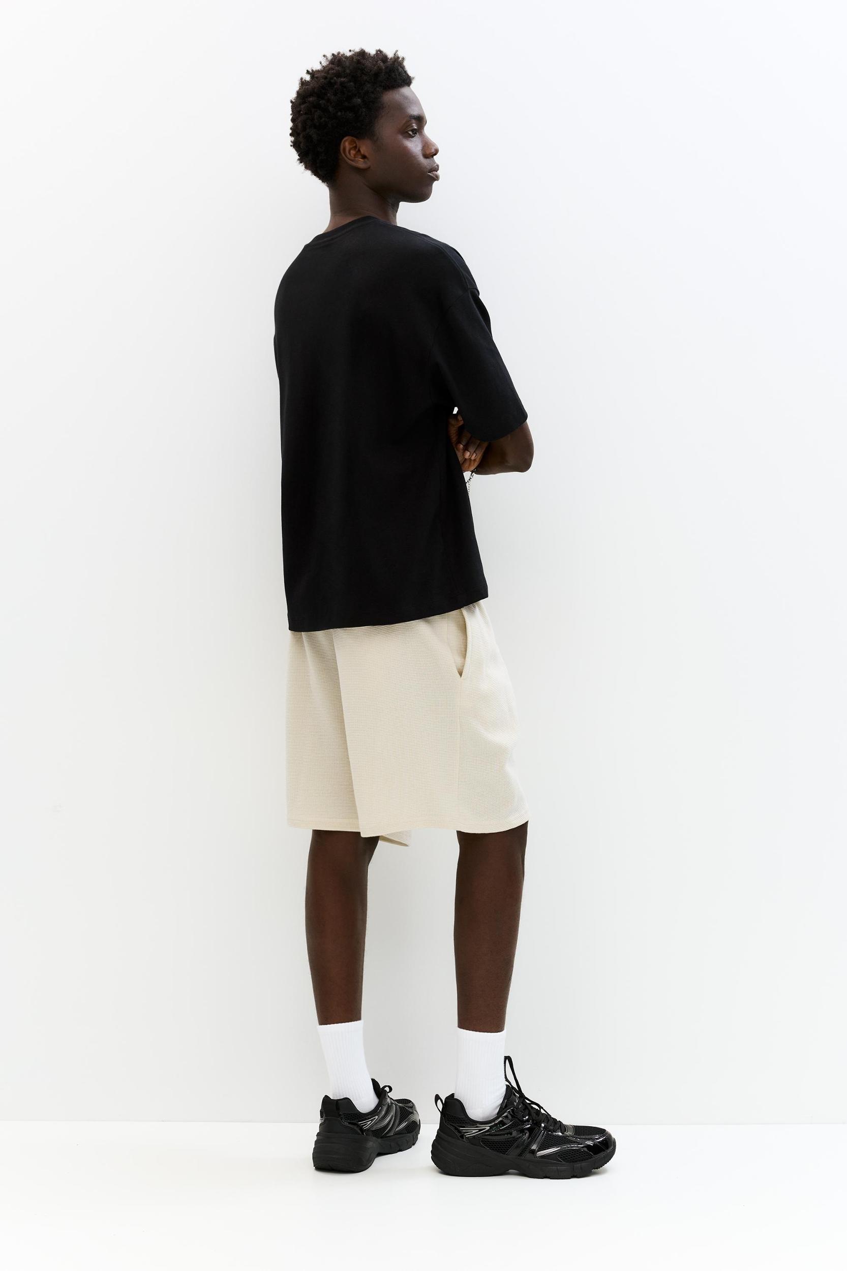 Jogger Bermuda shorts in waffle-knit fabric Product Image