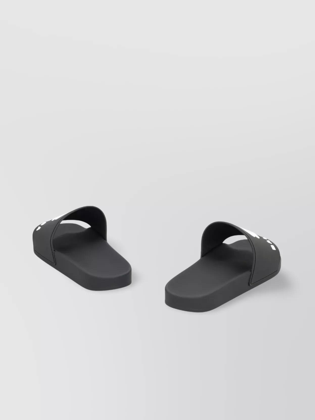 BALENCIAGA Rubber Slide Sandals For The Pool Men In Black White Product Image