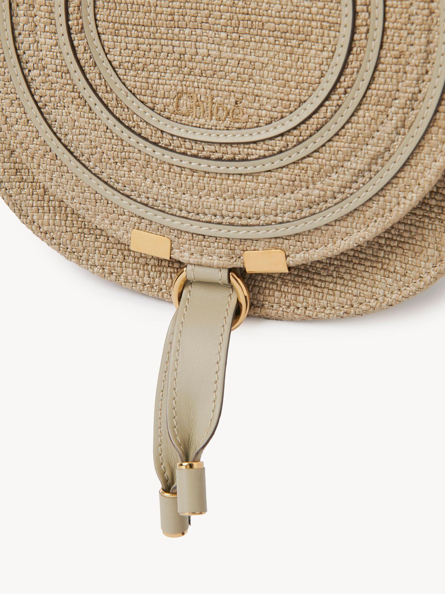Small Marcie saddle bag in raffia-effect fibers Product Image