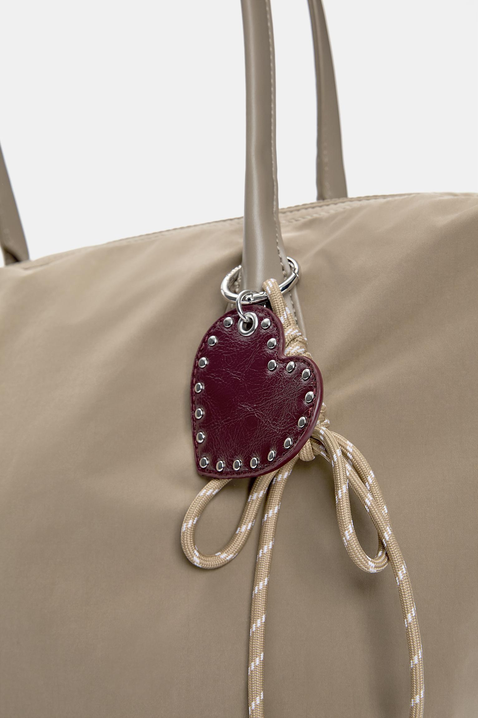 Nylon shopper bag with charm detail Product Image