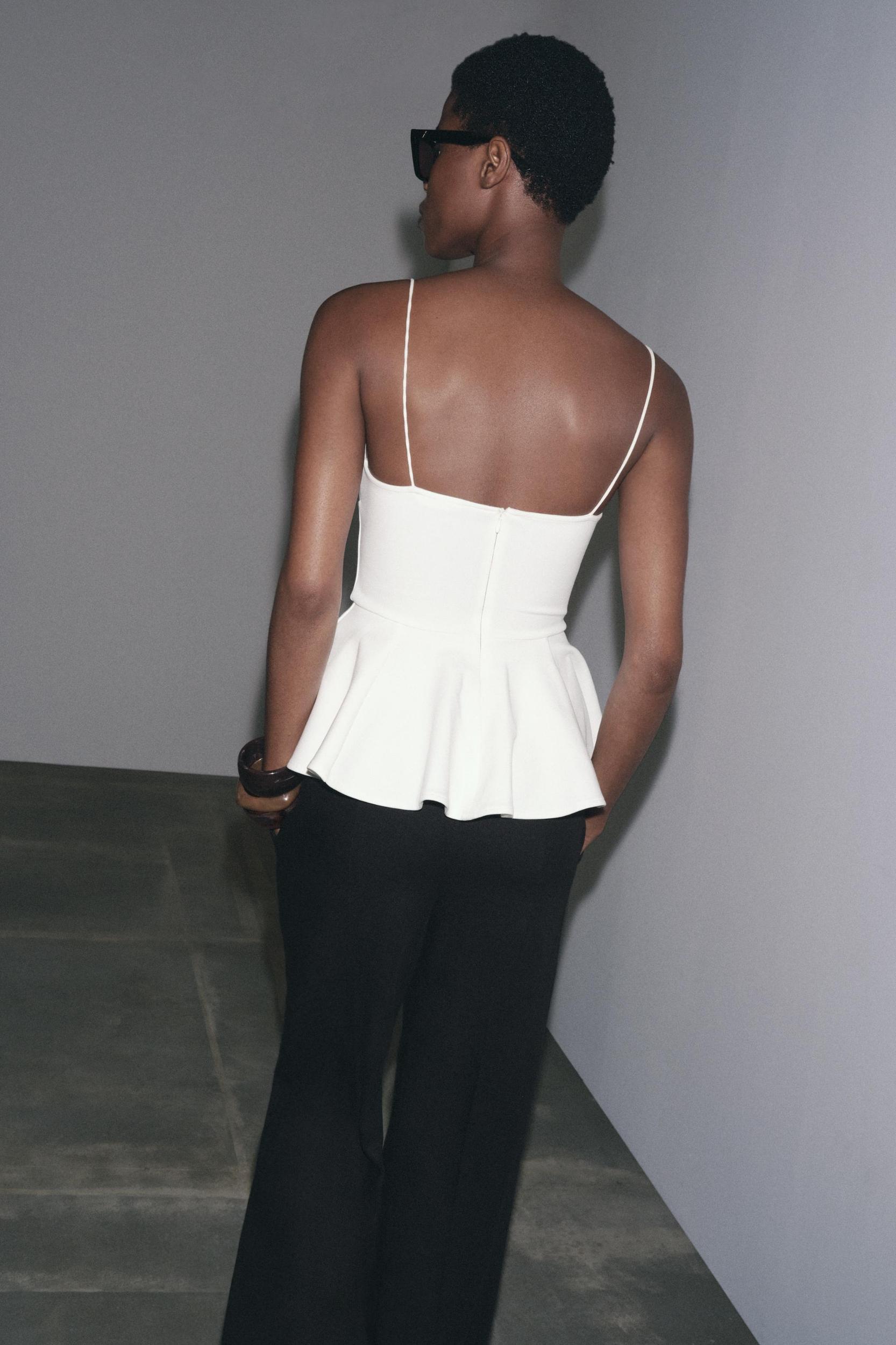 INTERLOCK PEPLUM STRAPPY TOP Product Image