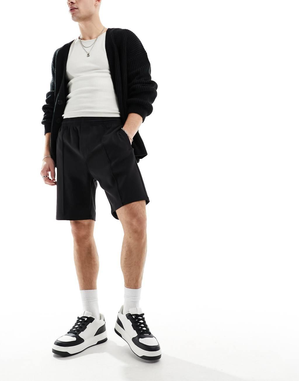 Weekday Ken relaxed fit shorts in black Product Image