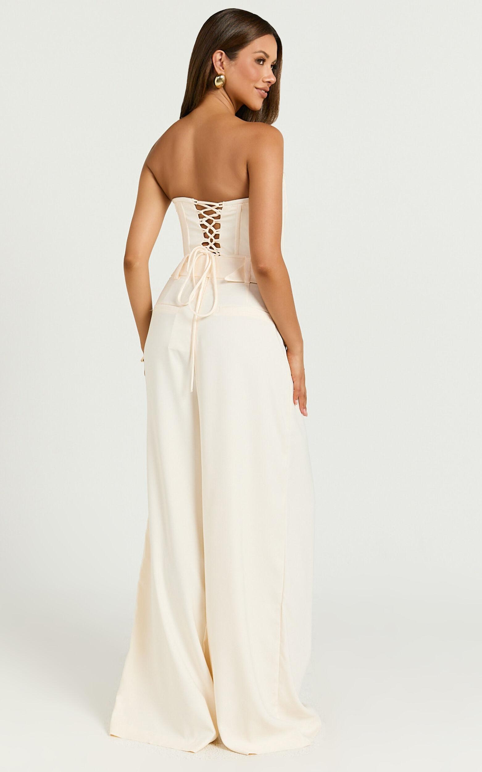 Amalie The Label - Raquelle Pleated Wid Leg Belted Pant in Ivory Product Image