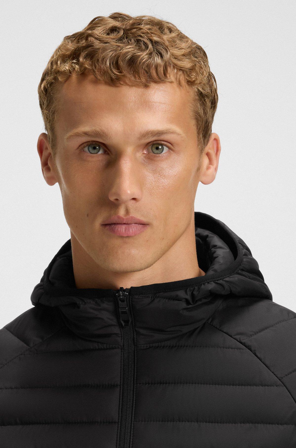 Water-repellent hooded jacket with decorative reflective details Product Image