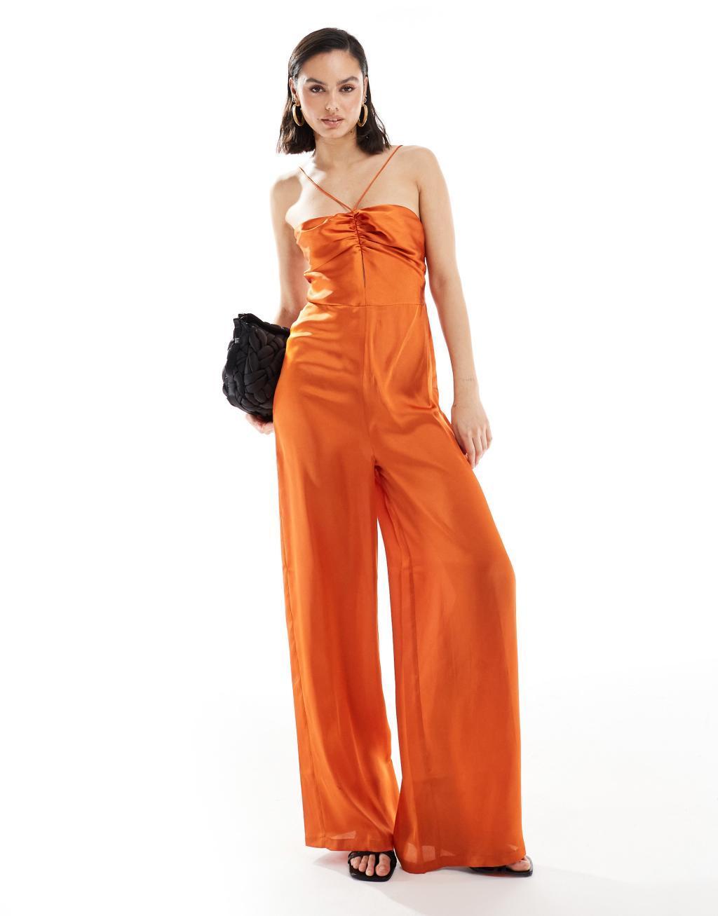 ASOS DESIGN halter tie ruched front straight leg satin jumpsuit in rust Product Image