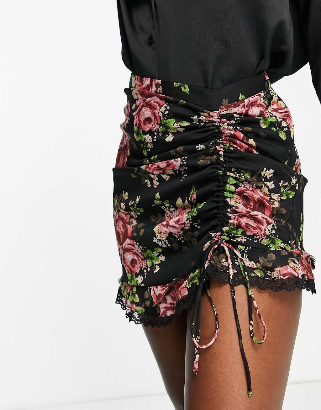 ASOS DESIGN ruched mini skirt with lace detail in dark floral print Product Image