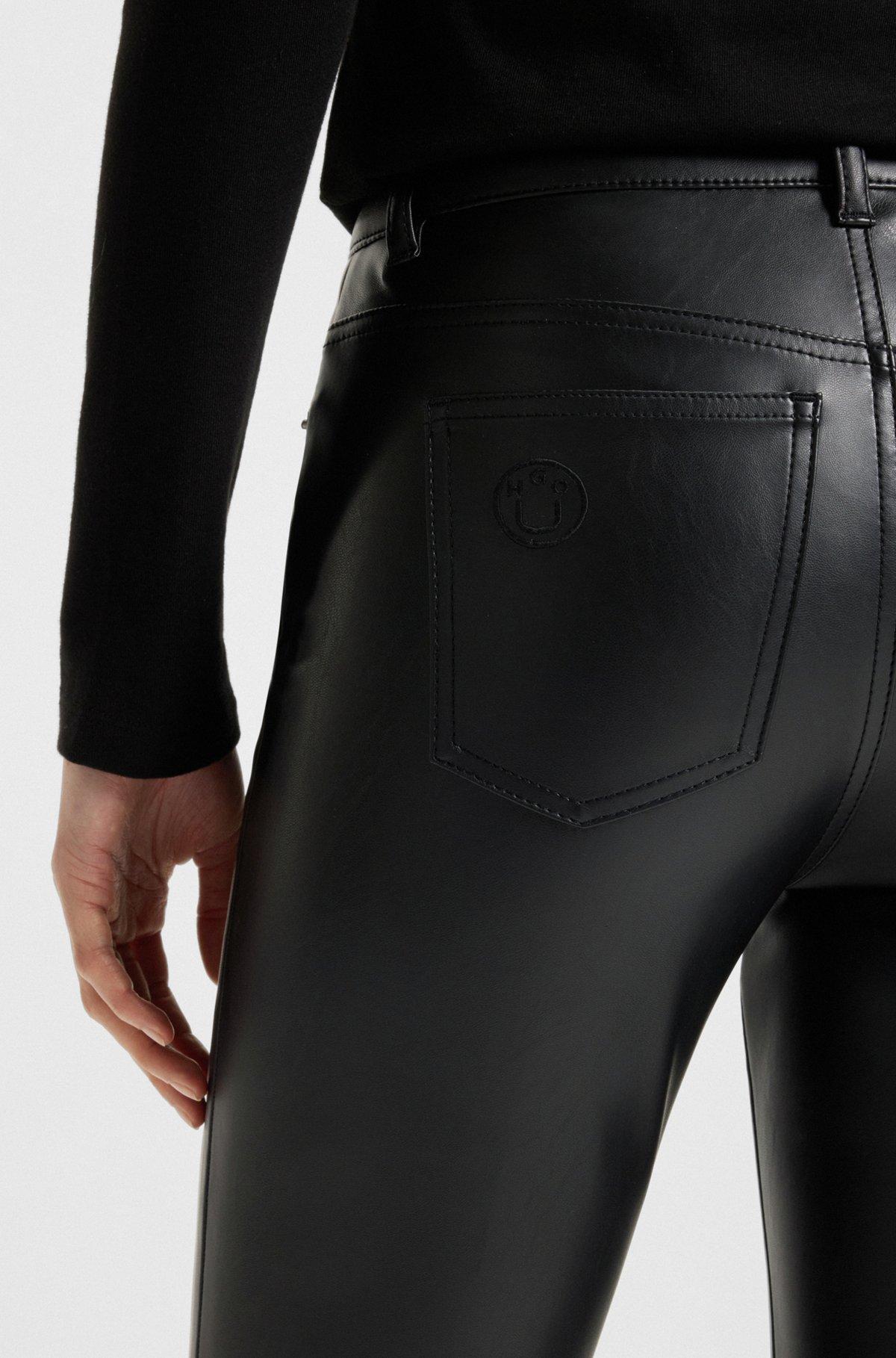 Faux-leather trousers with flared leg Product Image