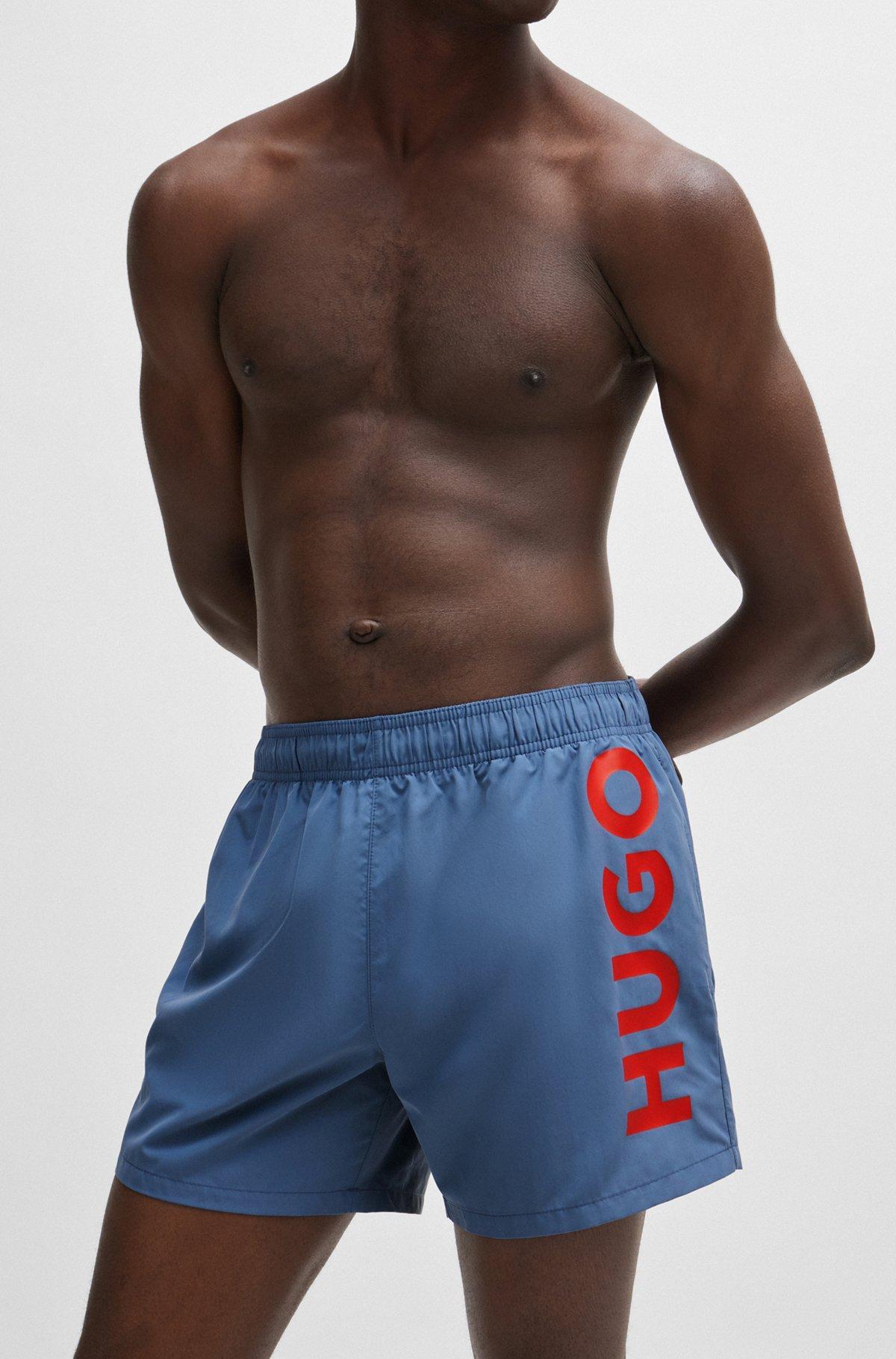 Fully lined swim shorts with vertical logo Product Image