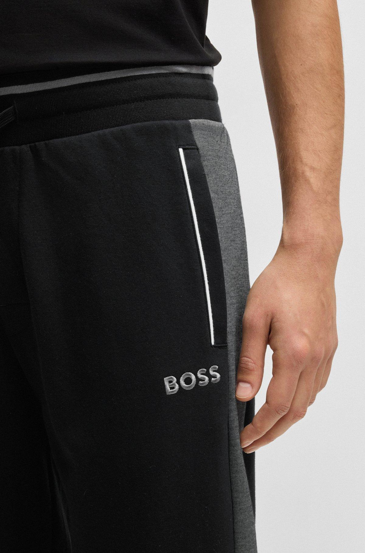 Tracksuit bottoms with contrast piping Product Image