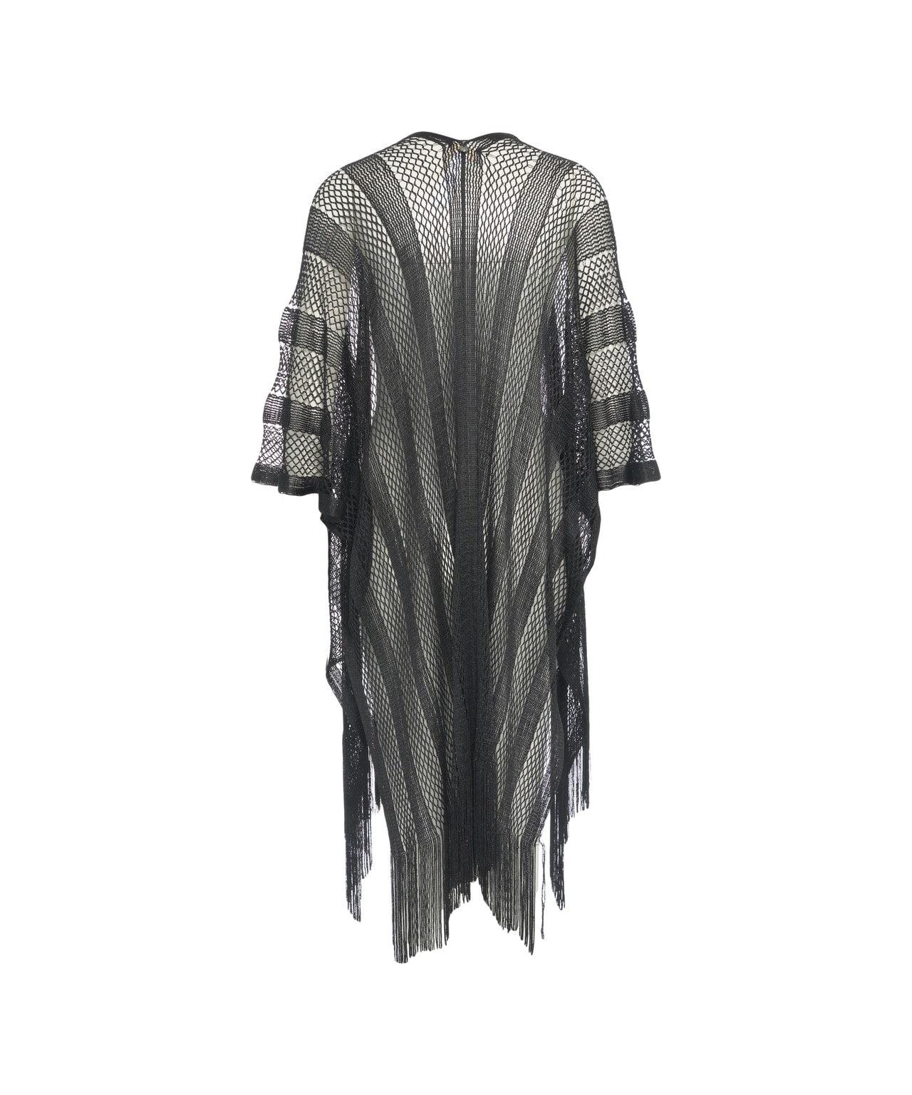 Poncho with fringes Product Image