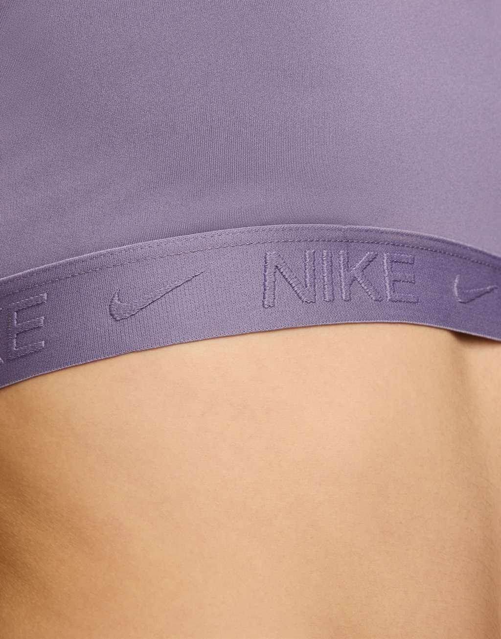 Nike Training Indy Dri-FIT light support sports bra in purple  Product Image