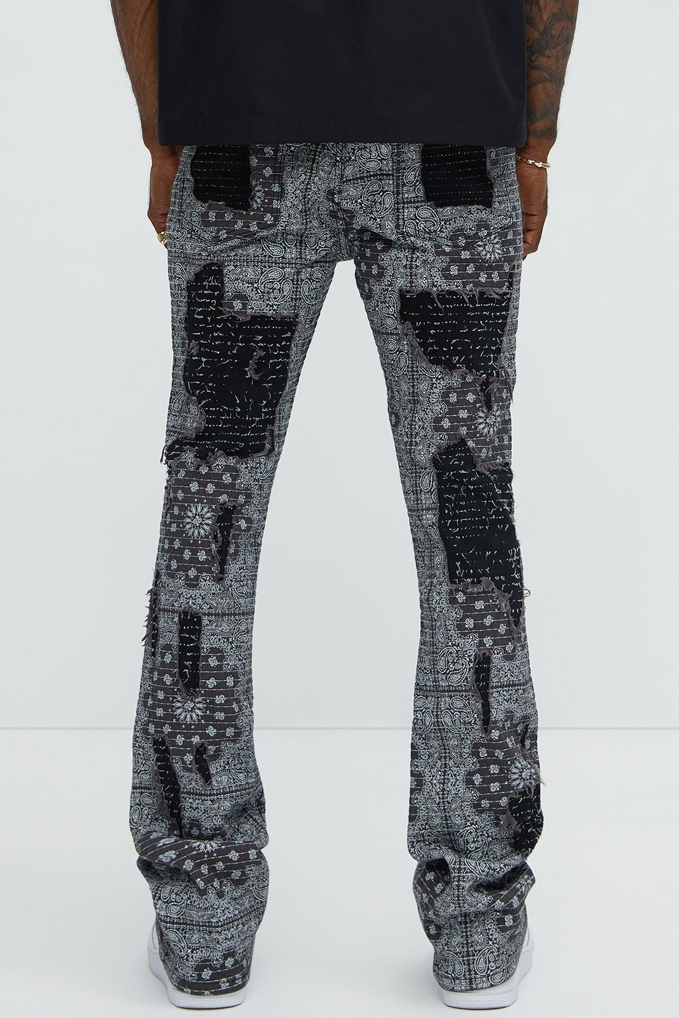 Shredded Shock Distressed Stacked Skinny Flare Jeans - Black Product Image