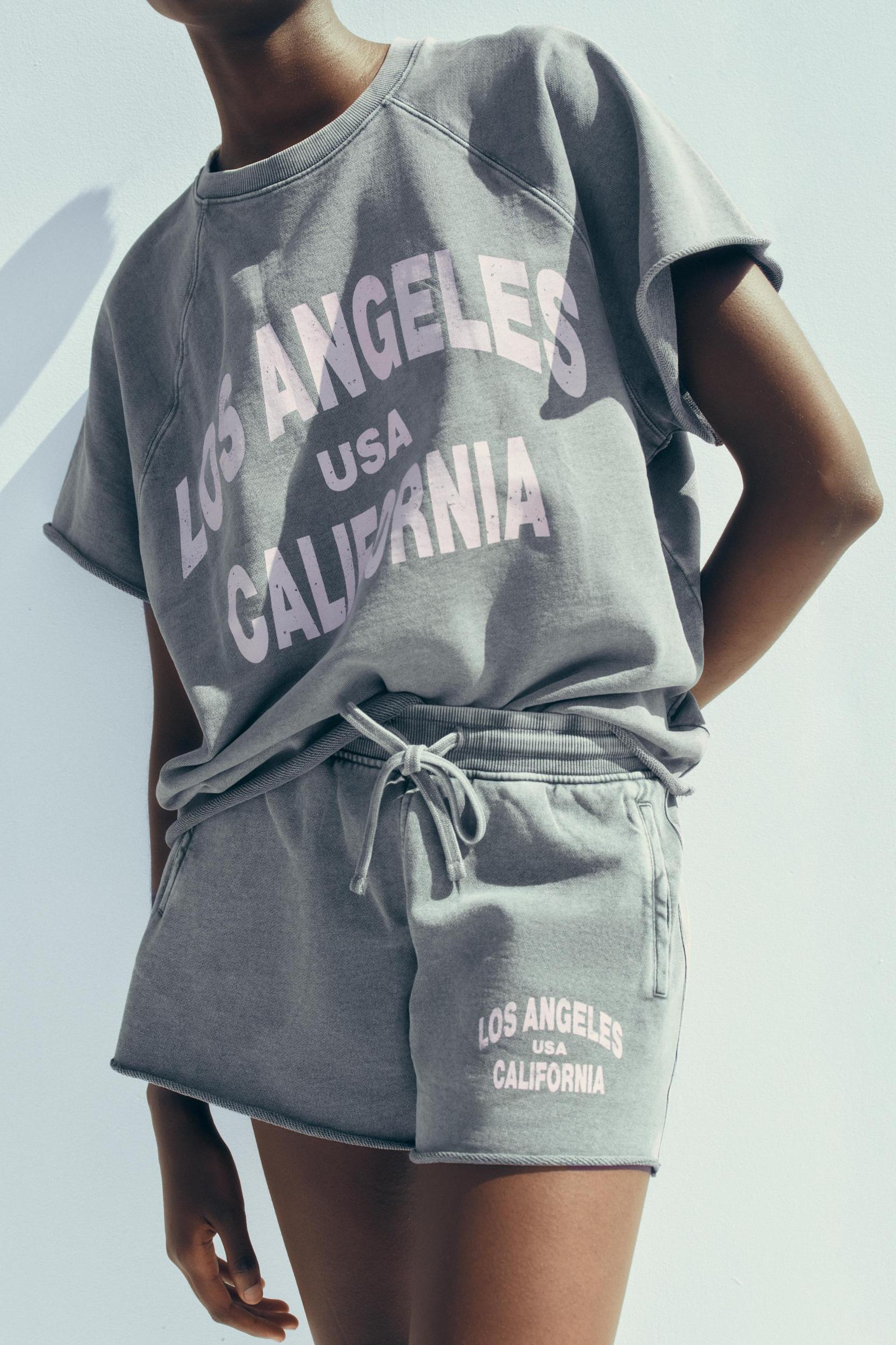 WASHED EFFECT TEXT SWEATSHORTS Product Image