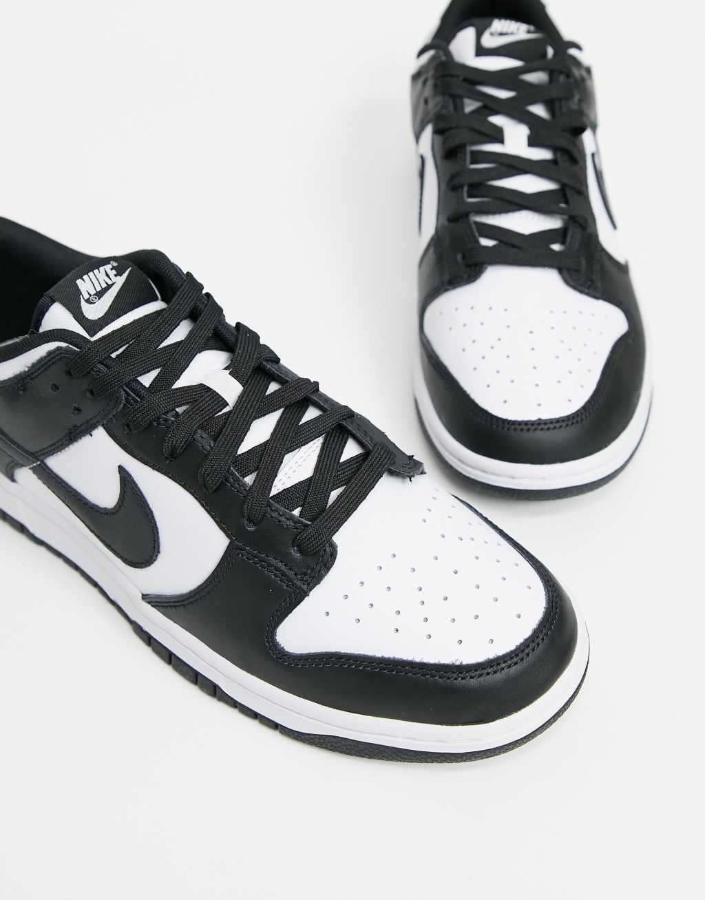 Nike Dunk Low sneakers in white/black Product Image