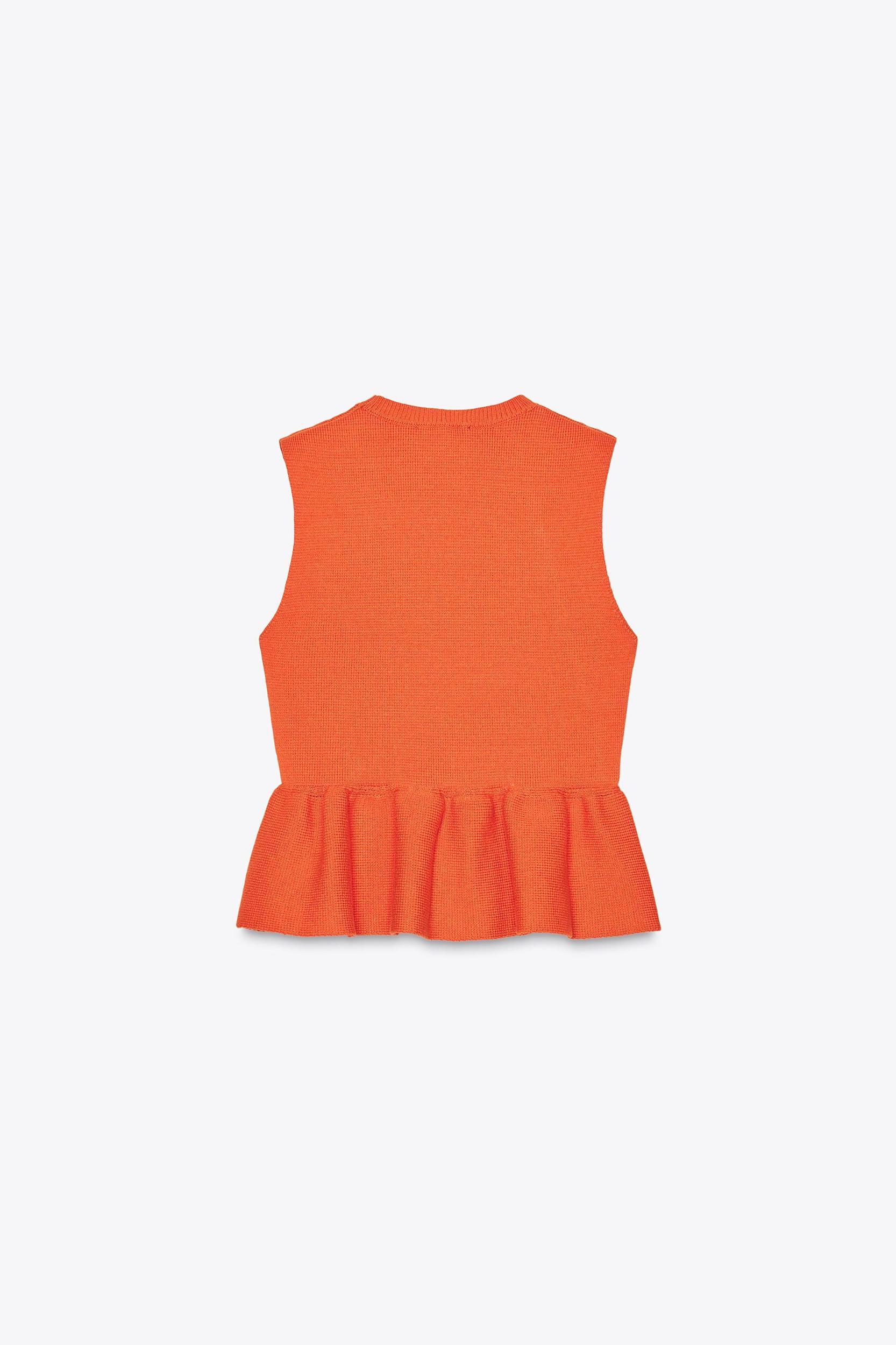 KNIT PEPLUM TOP Product Image