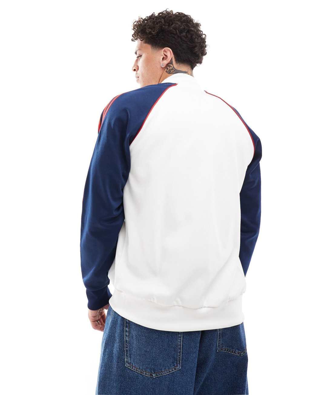 adidas Originals superstar tracktop in white & navy Product Image