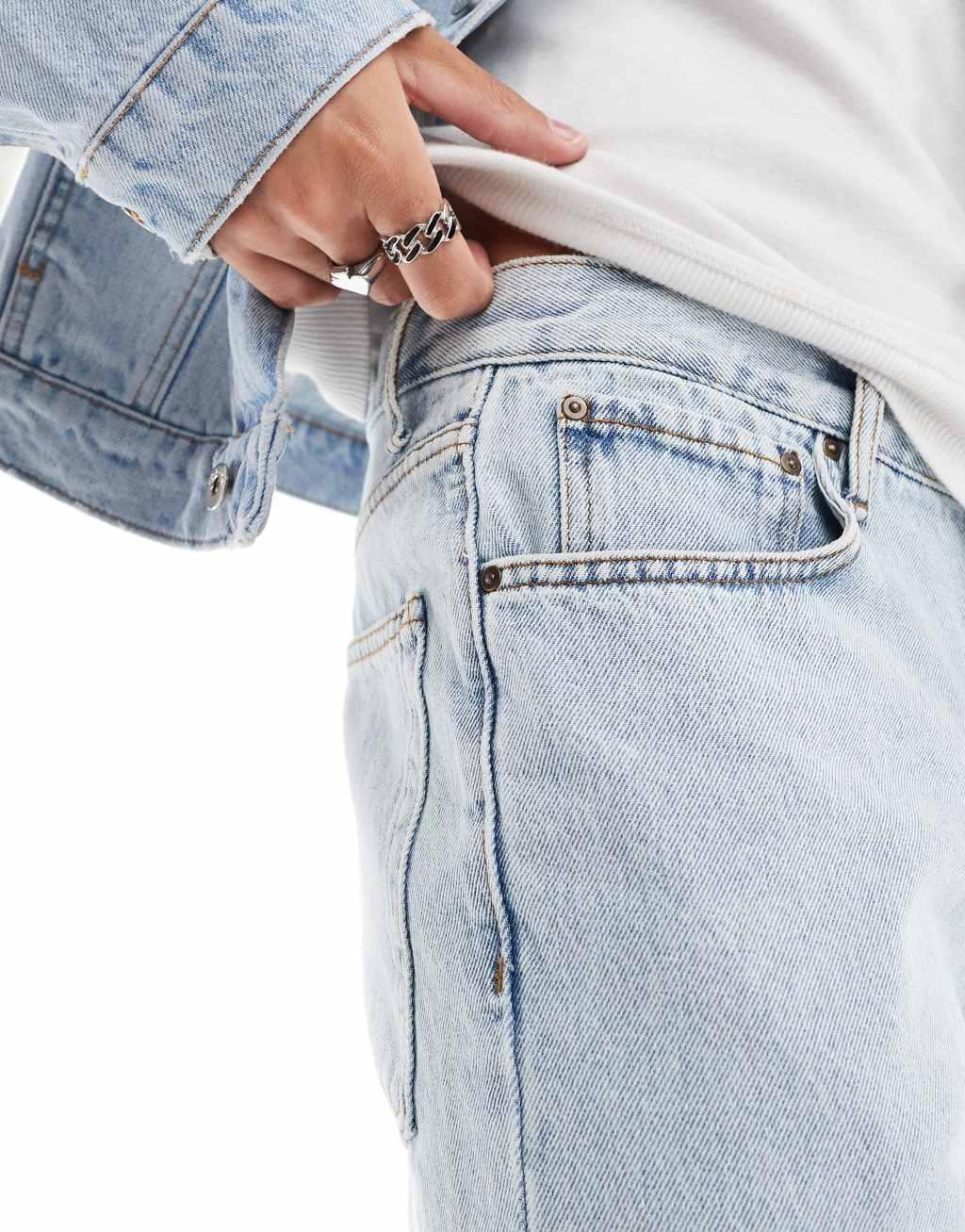 ASOS DESIGN straight leg jeans in light wash blue wash Product Image