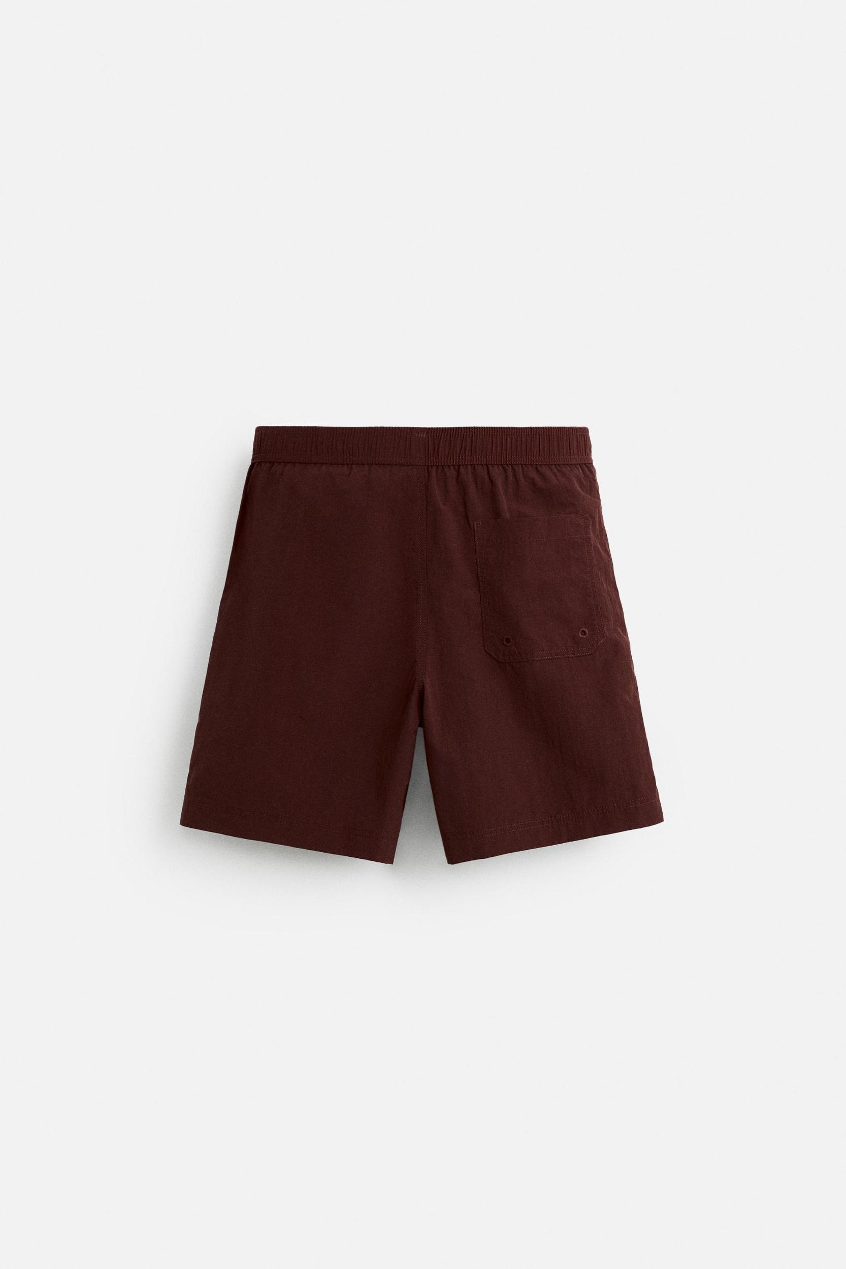 DRAWSTRING SWIM TRUNKS Product Image