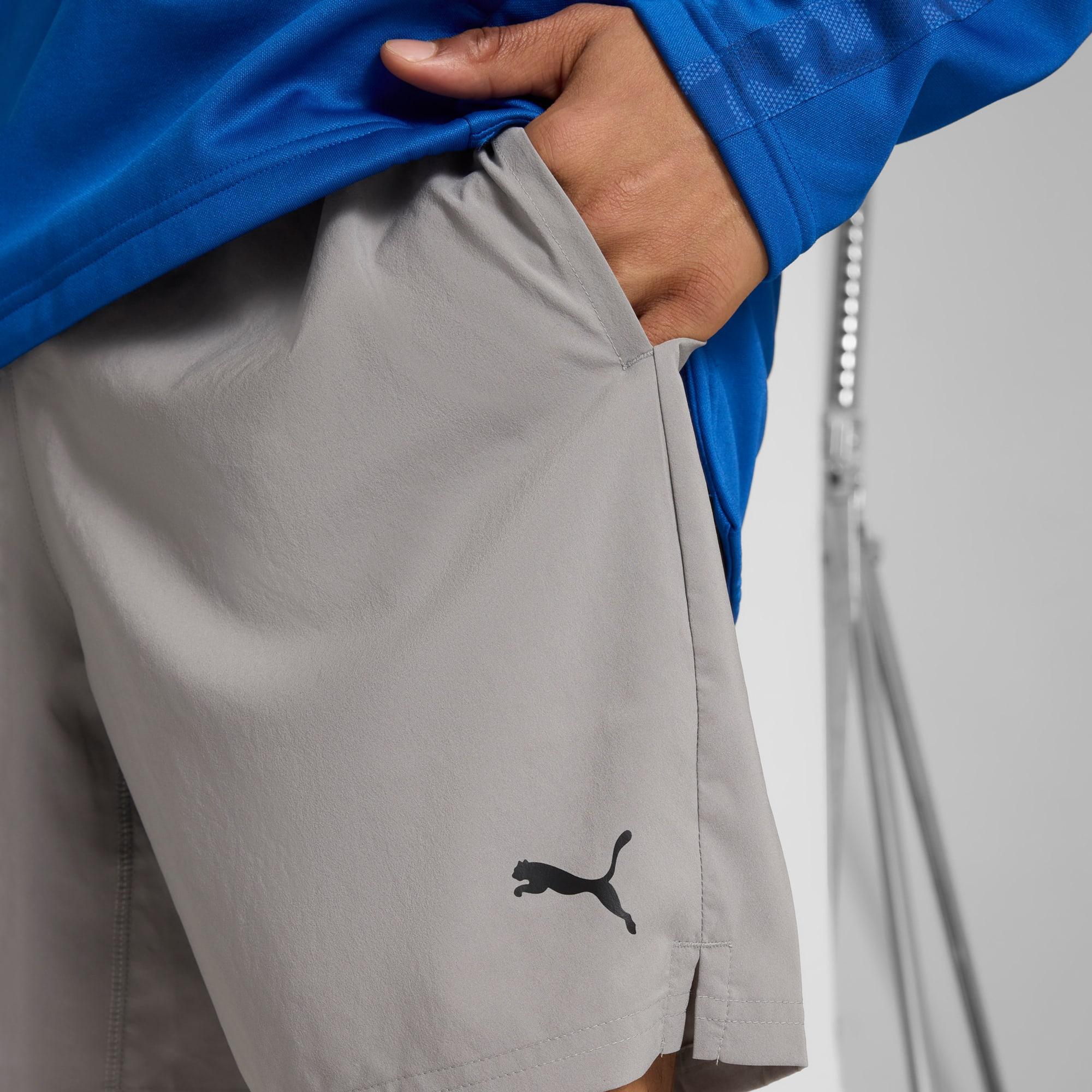 Train All Day ESSENTIALS Men's 7" Woven Shorts Product Image