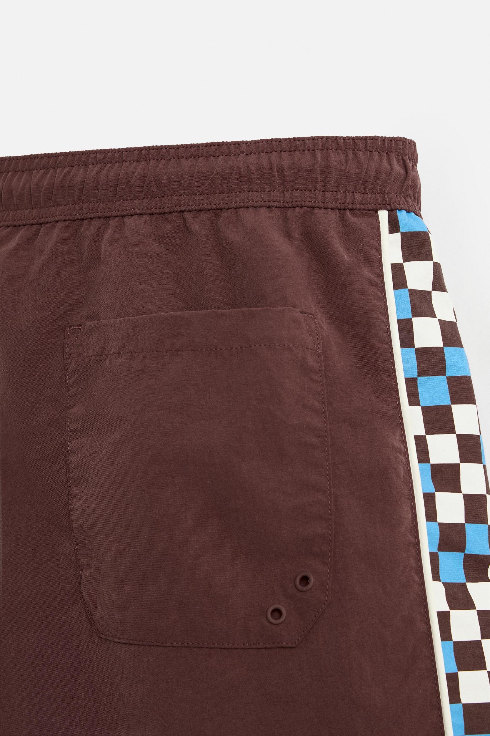 LONG SWIMSUIT WITH CONTRAST STRIPE Product Image