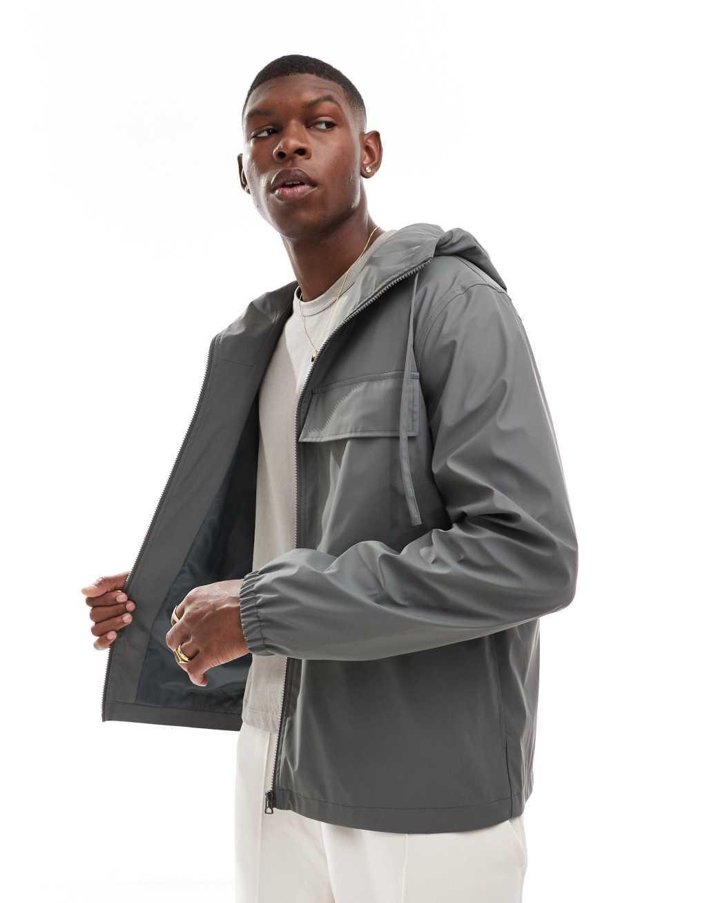 ASOS DESIGN rubberized rain jacket with chest pockets in charcoal Product Image