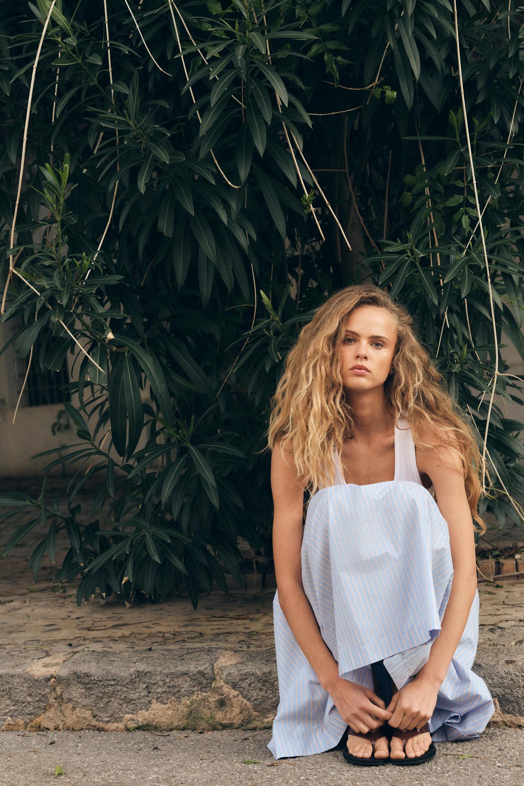 PLEATED STRIPED MIDI SKIRT Product Image