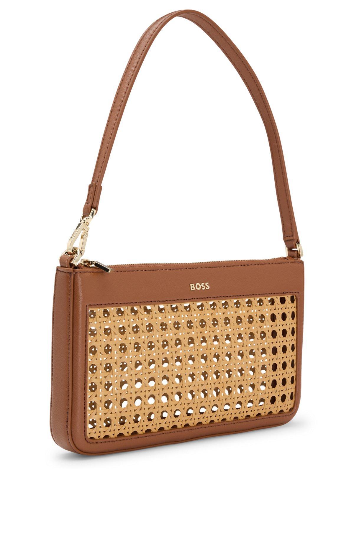 Woven shoulder bag with partially detachable handle Product Image