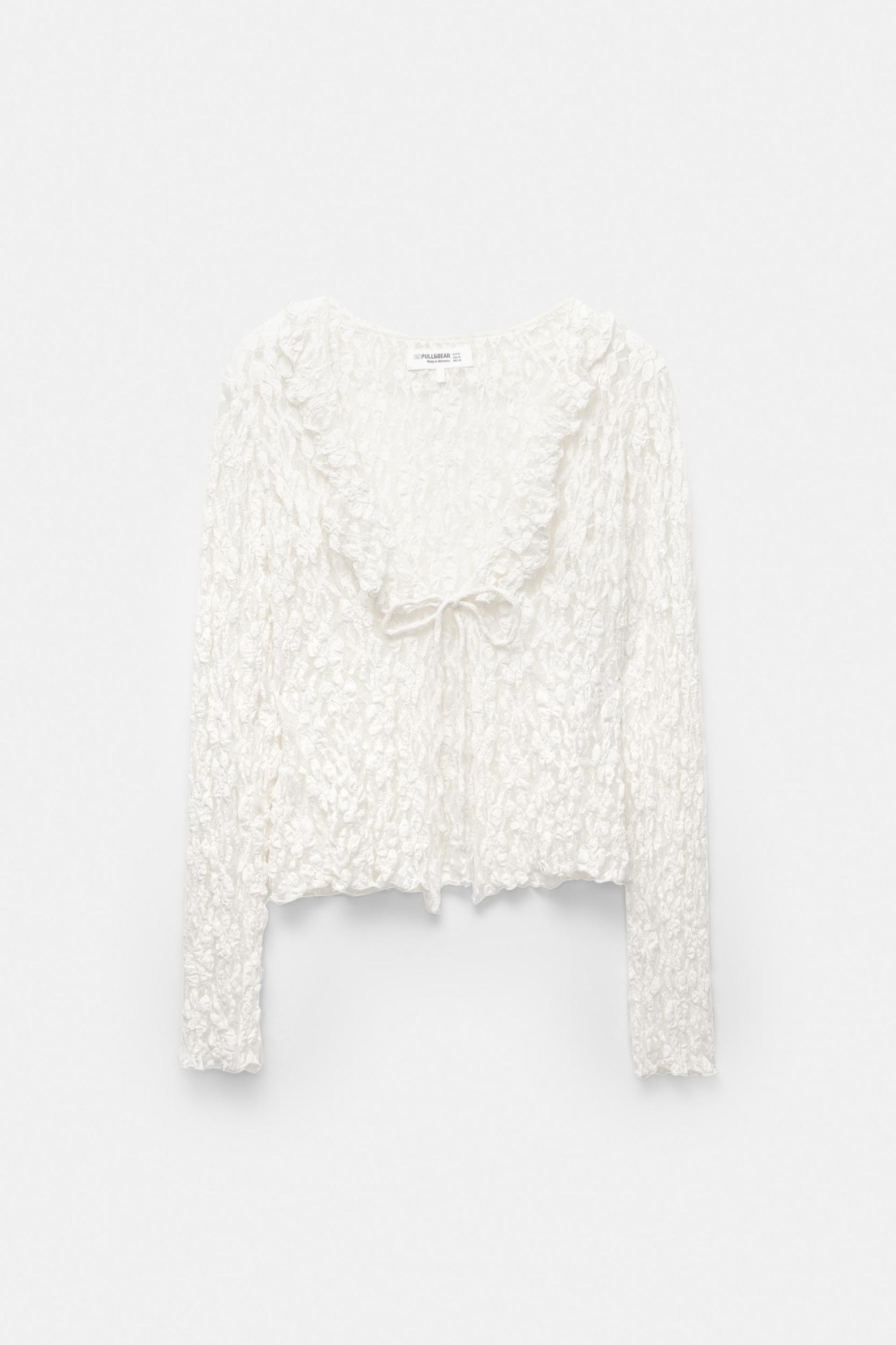 Lace blouse with ruffles Product Image