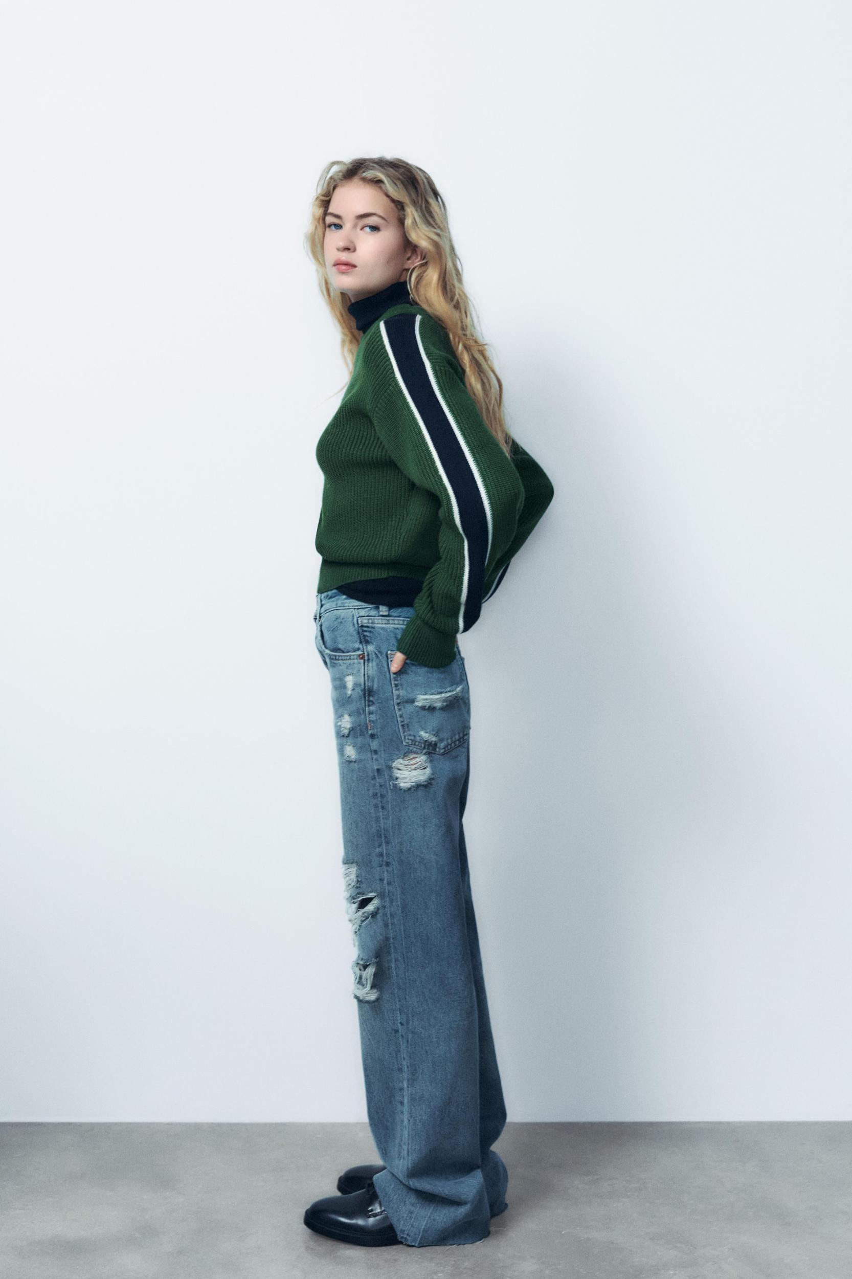 KNIT SWEATER WITH SIDE STRIPE Product Image