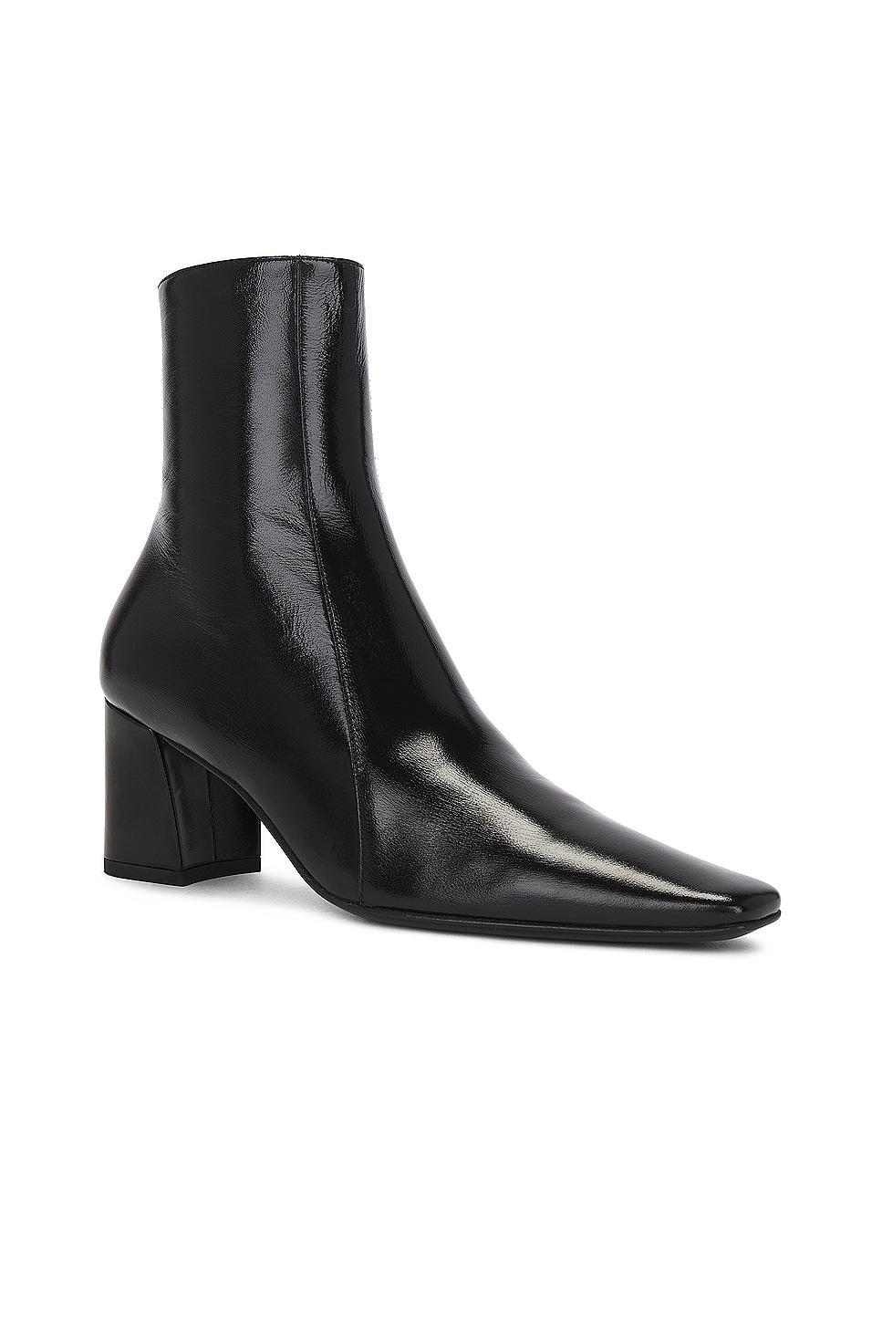 Saint Laurent Rainer Zipped Bootie in Noir - Black. Size 42 (also in 37.5). Product Image